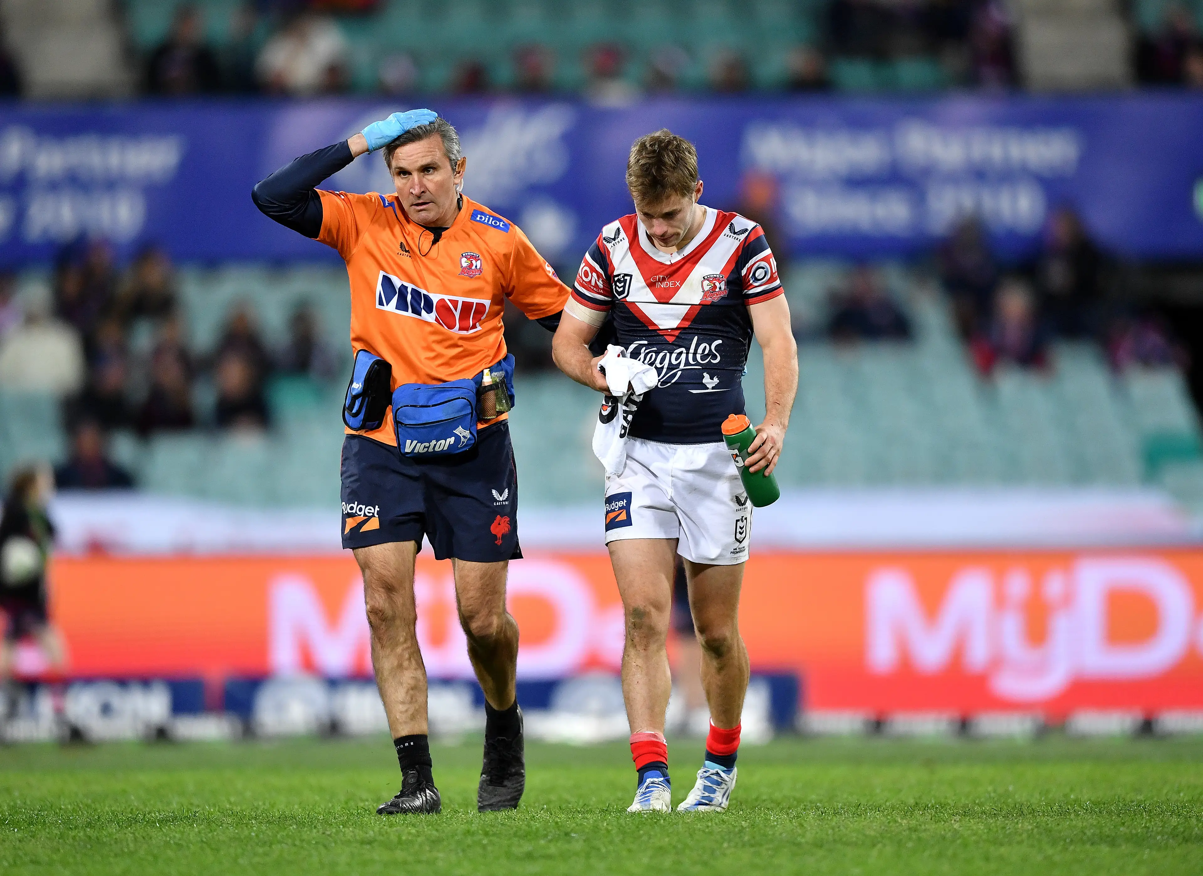 NRL star Sam Walker is taken off for a HIA.