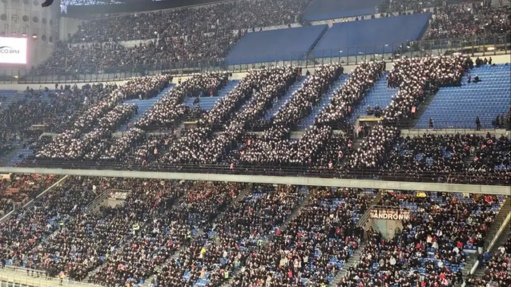 AC Milan supporters protest against the management during the home defeat to Atalanta.