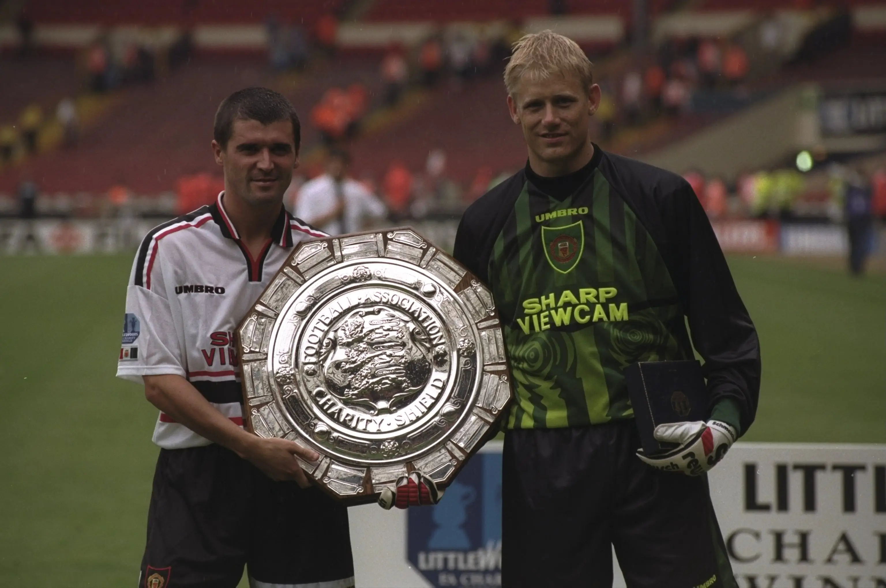 Peter Schmeichel and Roy Keane with the 1997 Charity Shield- Getty