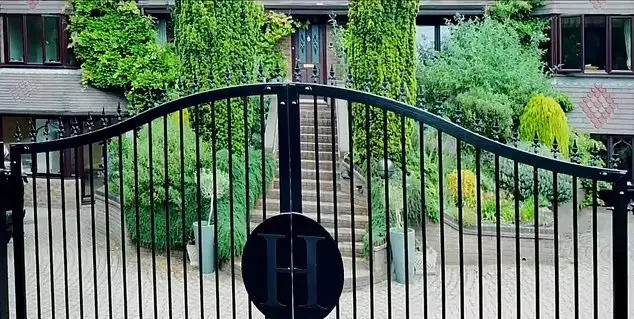 The gates to the stunning home bear the 'H' for the strongman's surname. (Image: Eddie Hall)