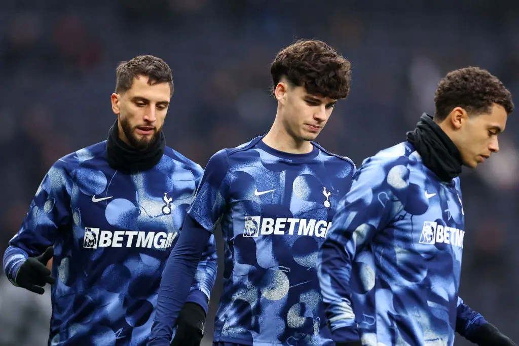 Rodrigo Bentancur (left) warms up before Tottenham's Premier League fixture against Ipswich (Image: Getty)