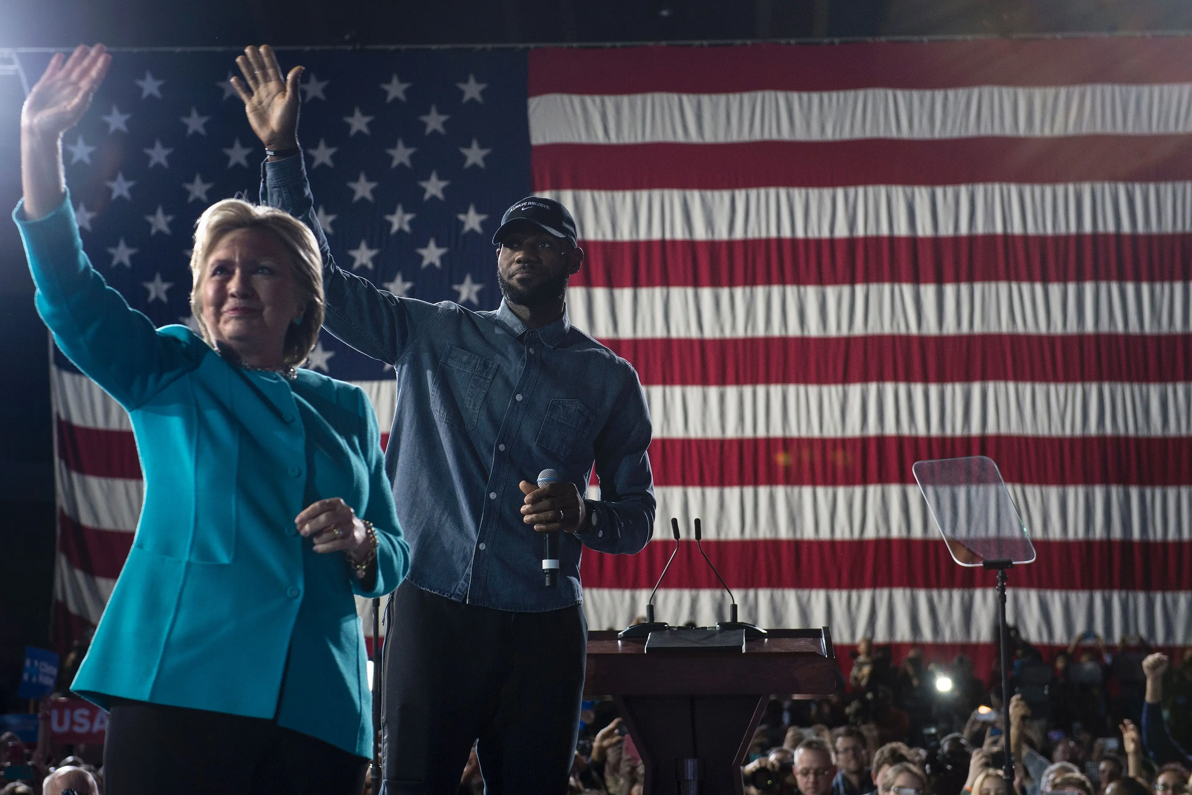 LeBron James and Hillary Clinton arrive for a rally at the Cleveland Public Auditorium in November 2016. Image credit: Getty