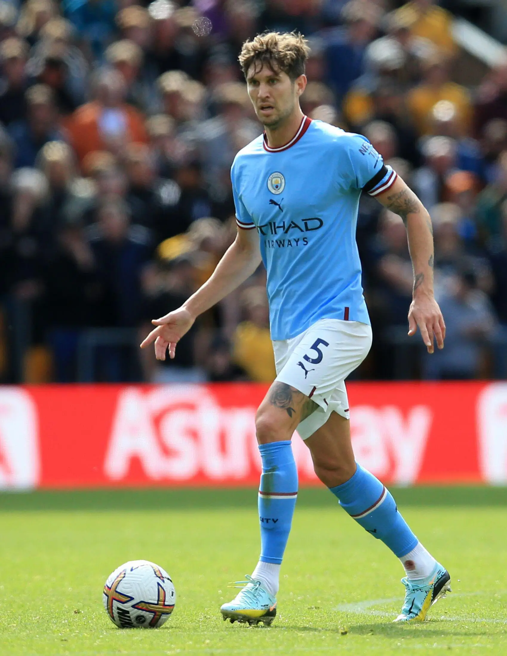 John Stones on the ball against Wolves (Action Plus Sports Images / Alamy)