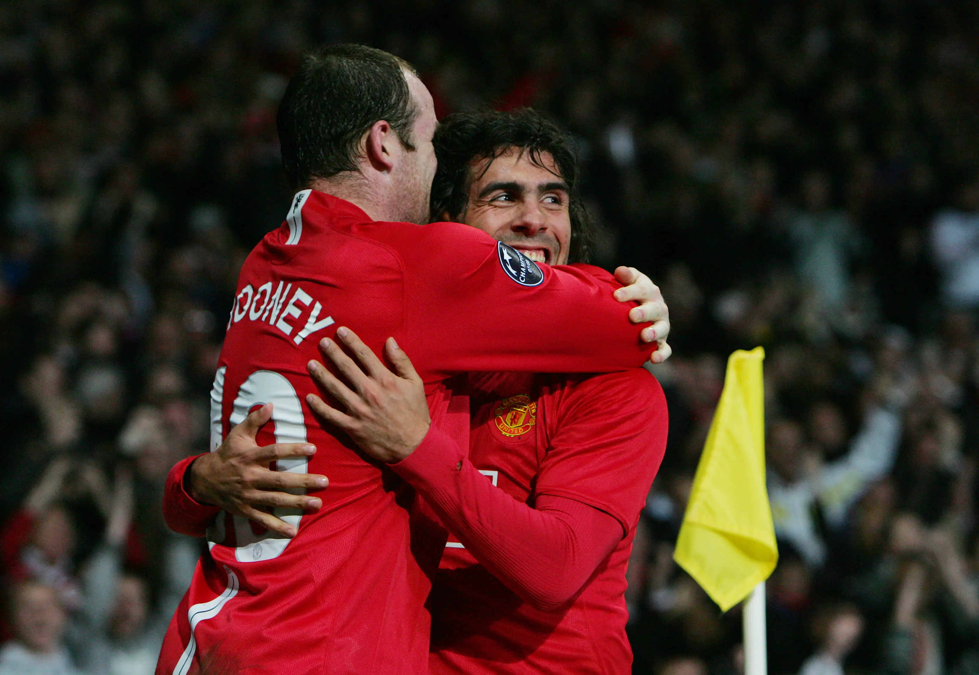 Wayne Rooney and Carlos Tevez celebrate a Manchester United goal. Image: Getty 