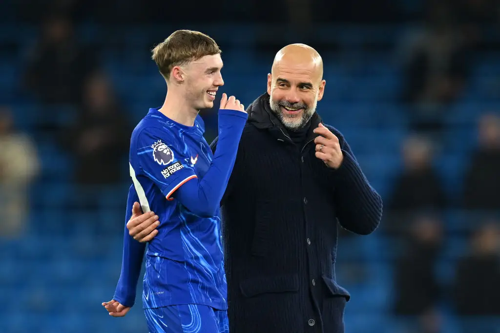 Gary Neville criticised Cole Palmer for having a friendly chat with Man City boss Pep Guardiola after Chelsea's 3-1 loss on Saturday. (Image: Getty)