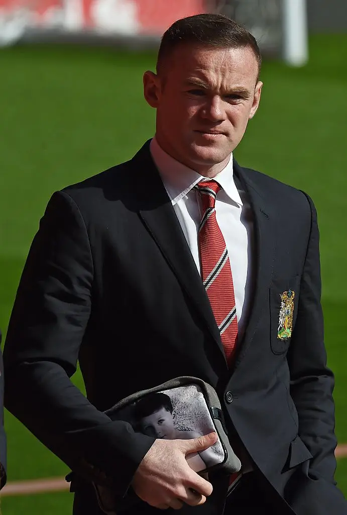 Wayne Rooney wearing the Manchester United club blazer (Credit:Getty)