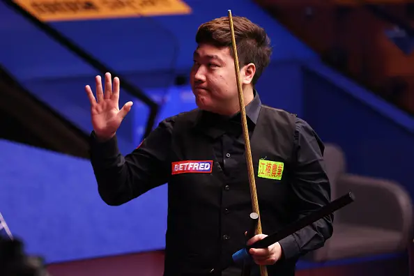 Yan Bingtao is currently banned from playing on the World Snooker Tour (Image: Getty)