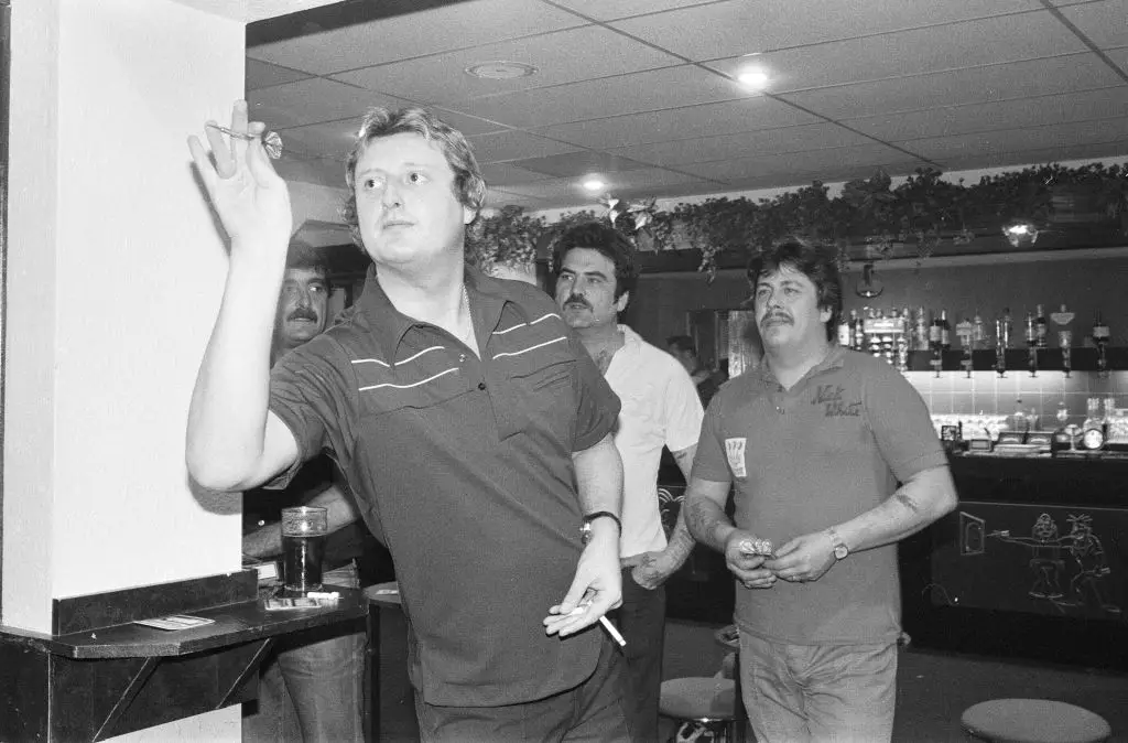 Eric Bristow (pictured throwing) was the dominant force in darts during the 1980s (Image: Getty)