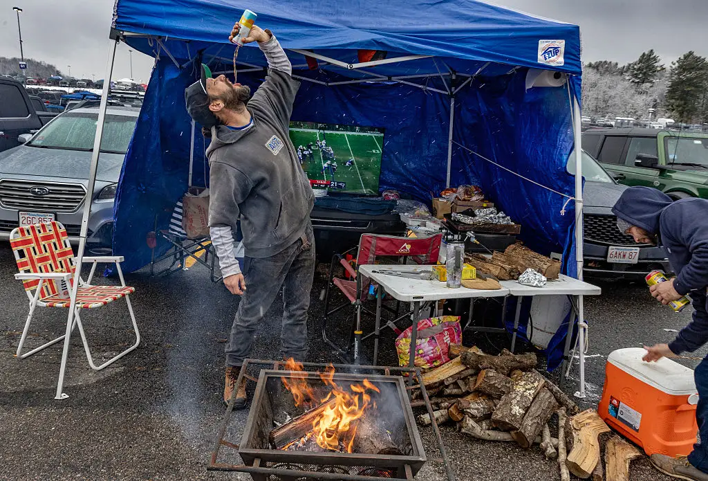 New England Patriots fans tailgate outside of Gillette Stadium. Image credit: Getty