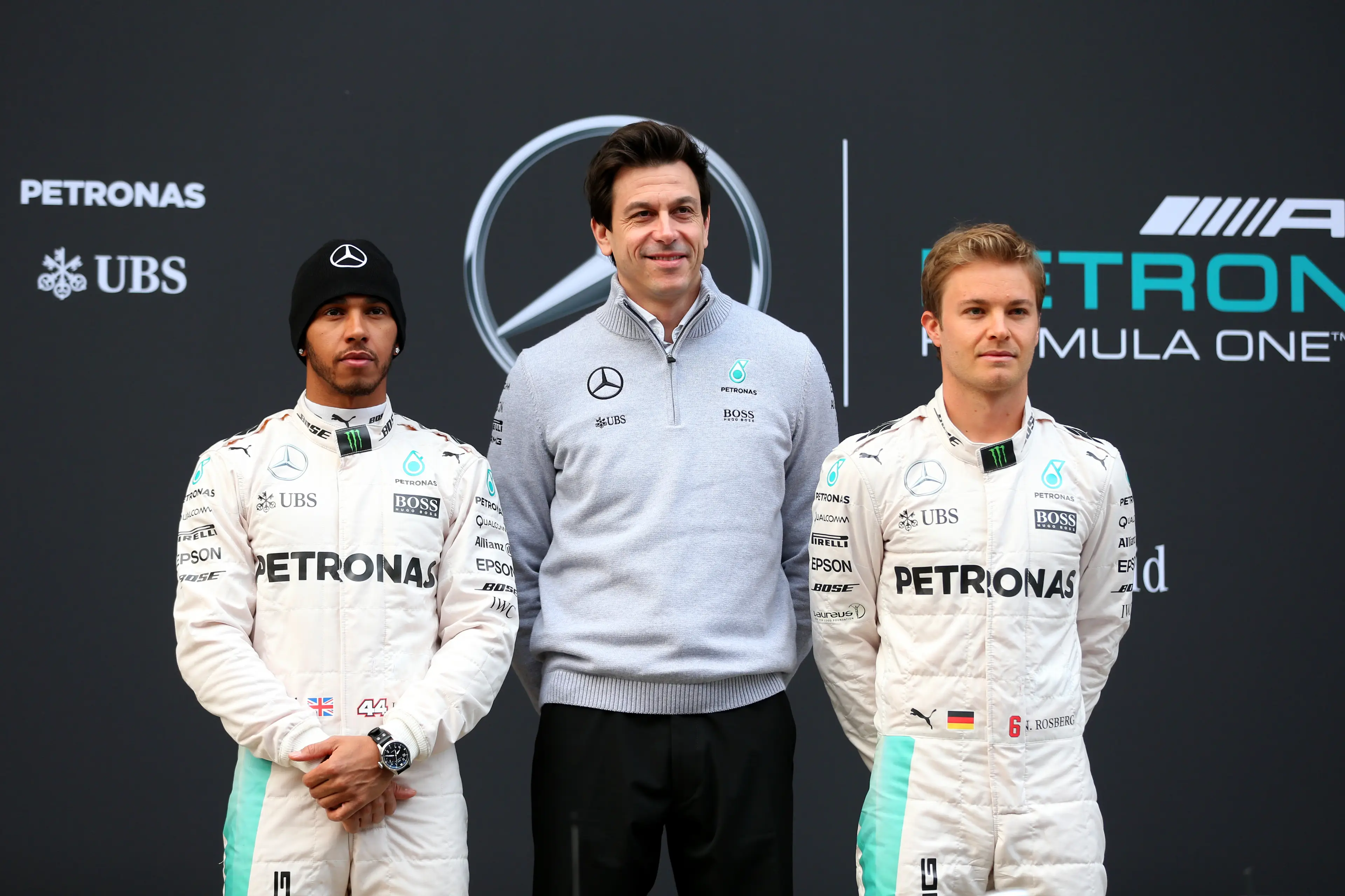 Mercedes team principal Toto Wolff with Hamilton and Rosberg.