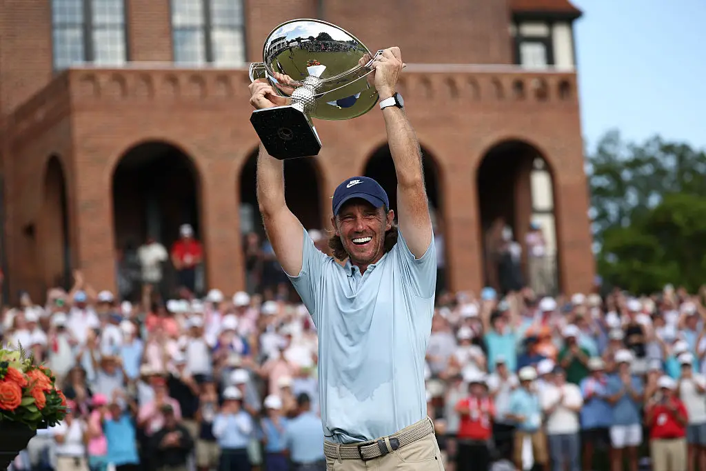 Tommy Fleetwood lifts the FedEx Cup (Credit:Getty)