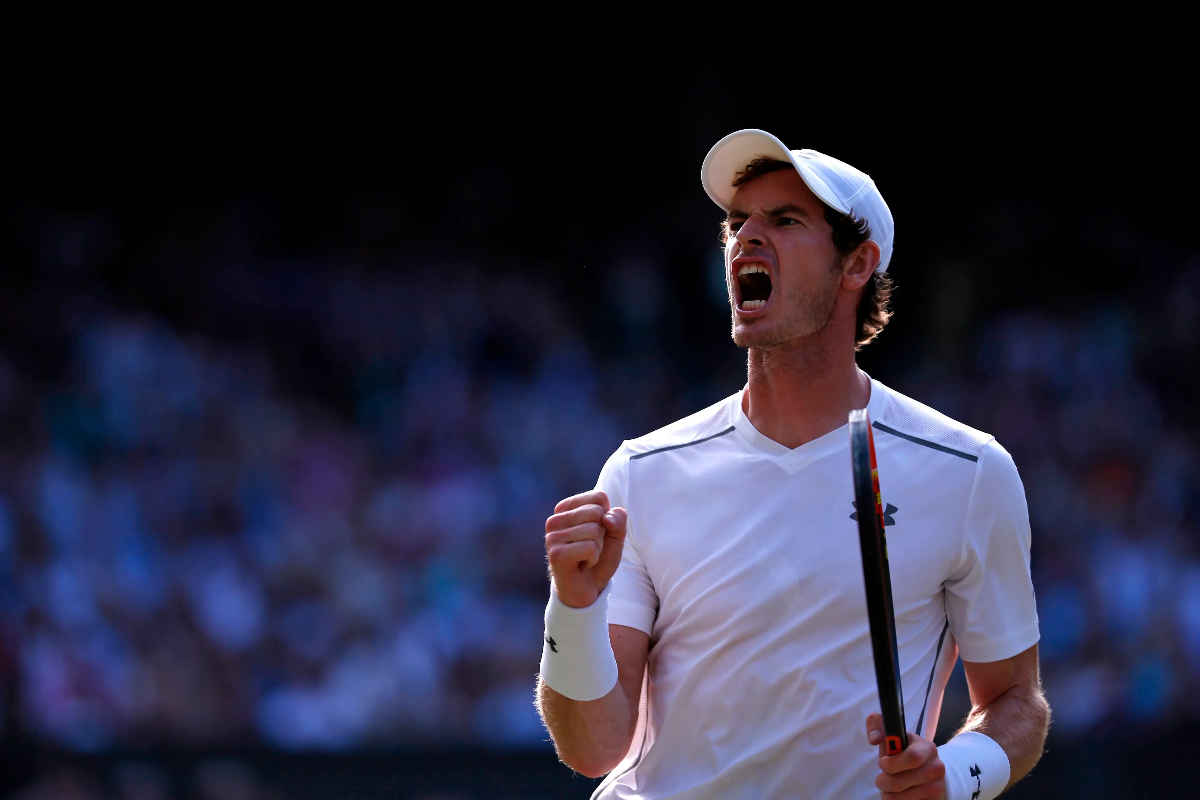 Andy Murray celebrates winning a point at Wimbledon. Image: Getty