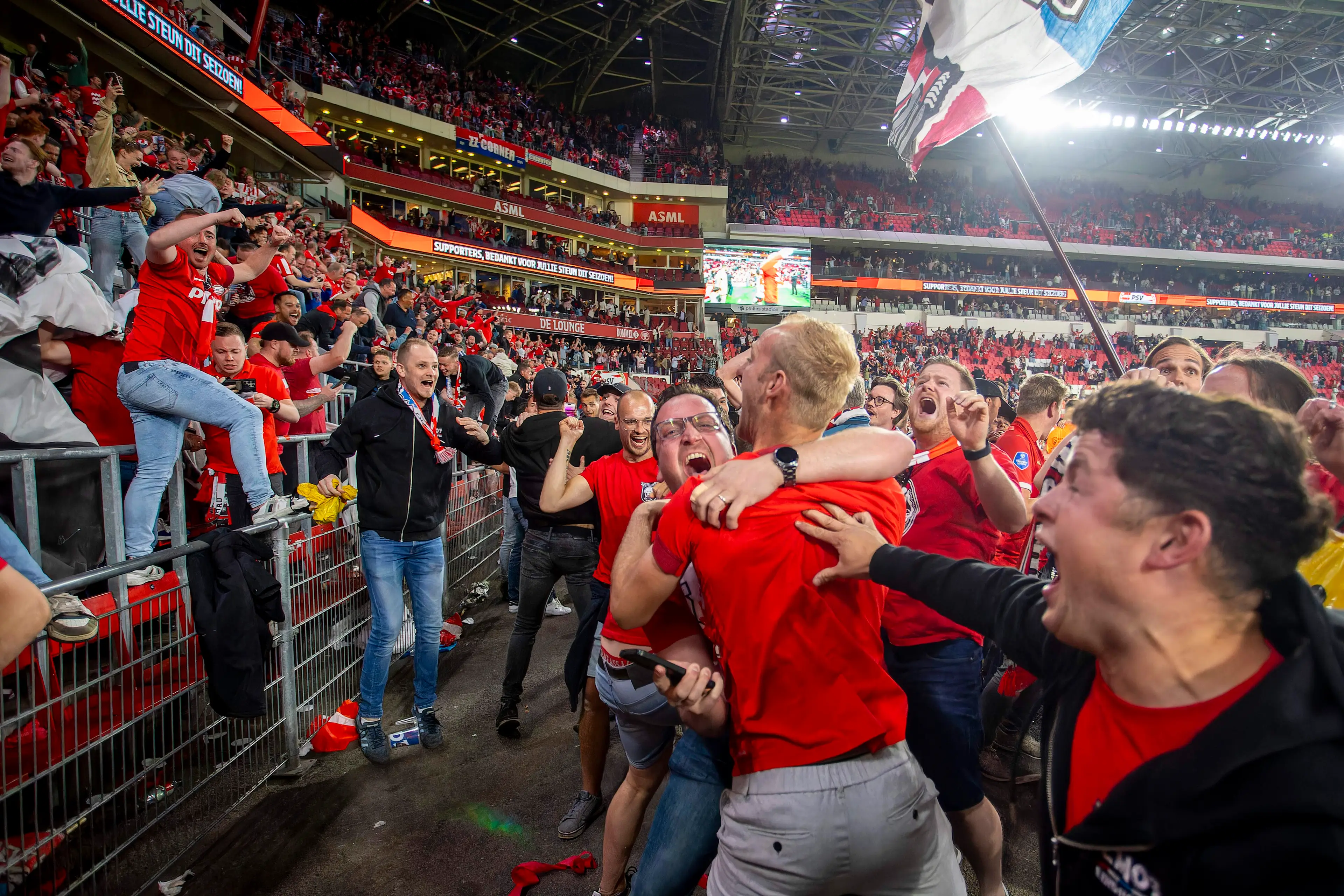 PSV fans erupted after seeing Ajax concede a 99th minute goal. Image: Getty
