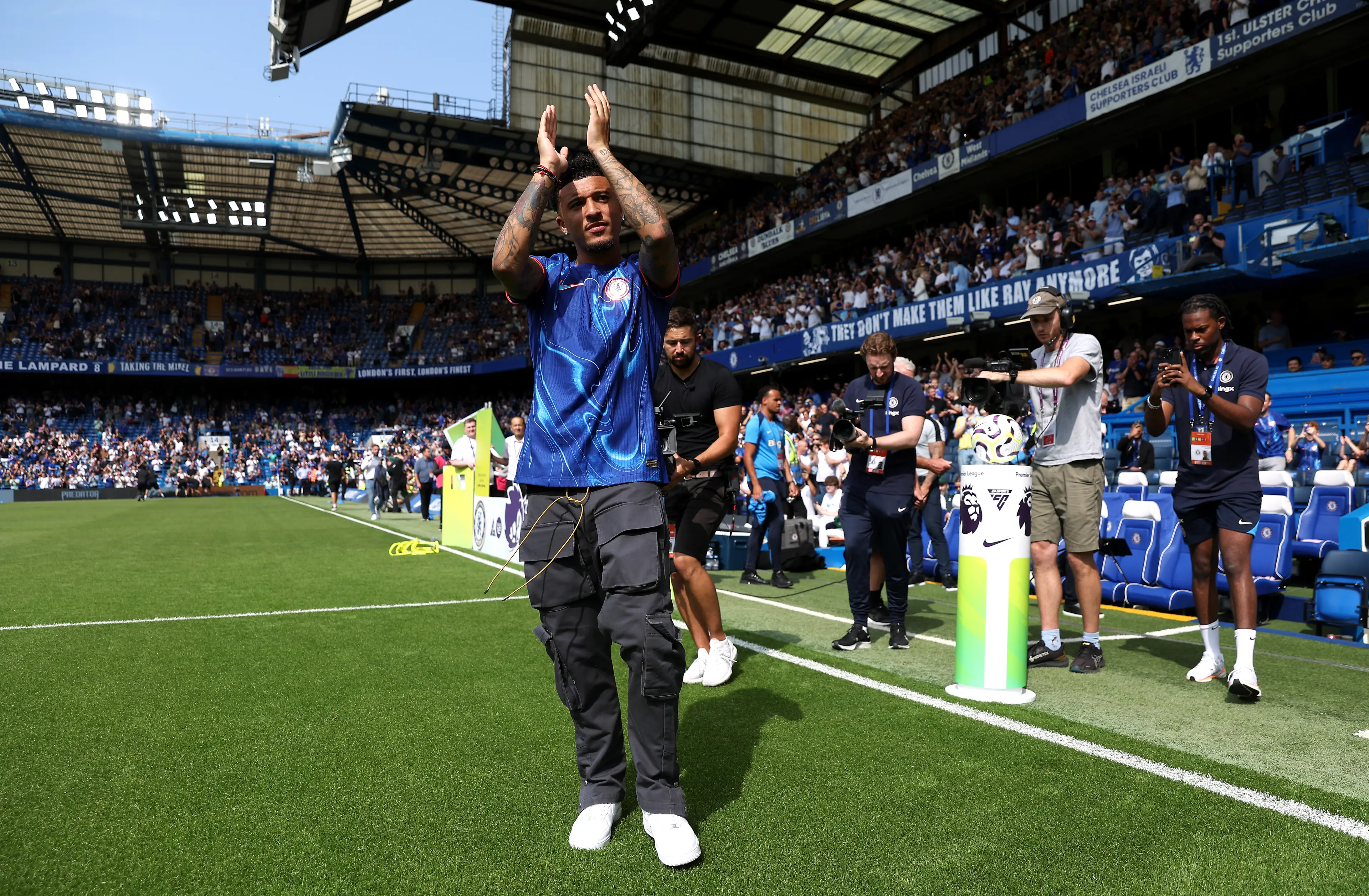 Jadon Sancho gets paraded at Stamford Bridge following his transfer to Chelsea. Image: Getty