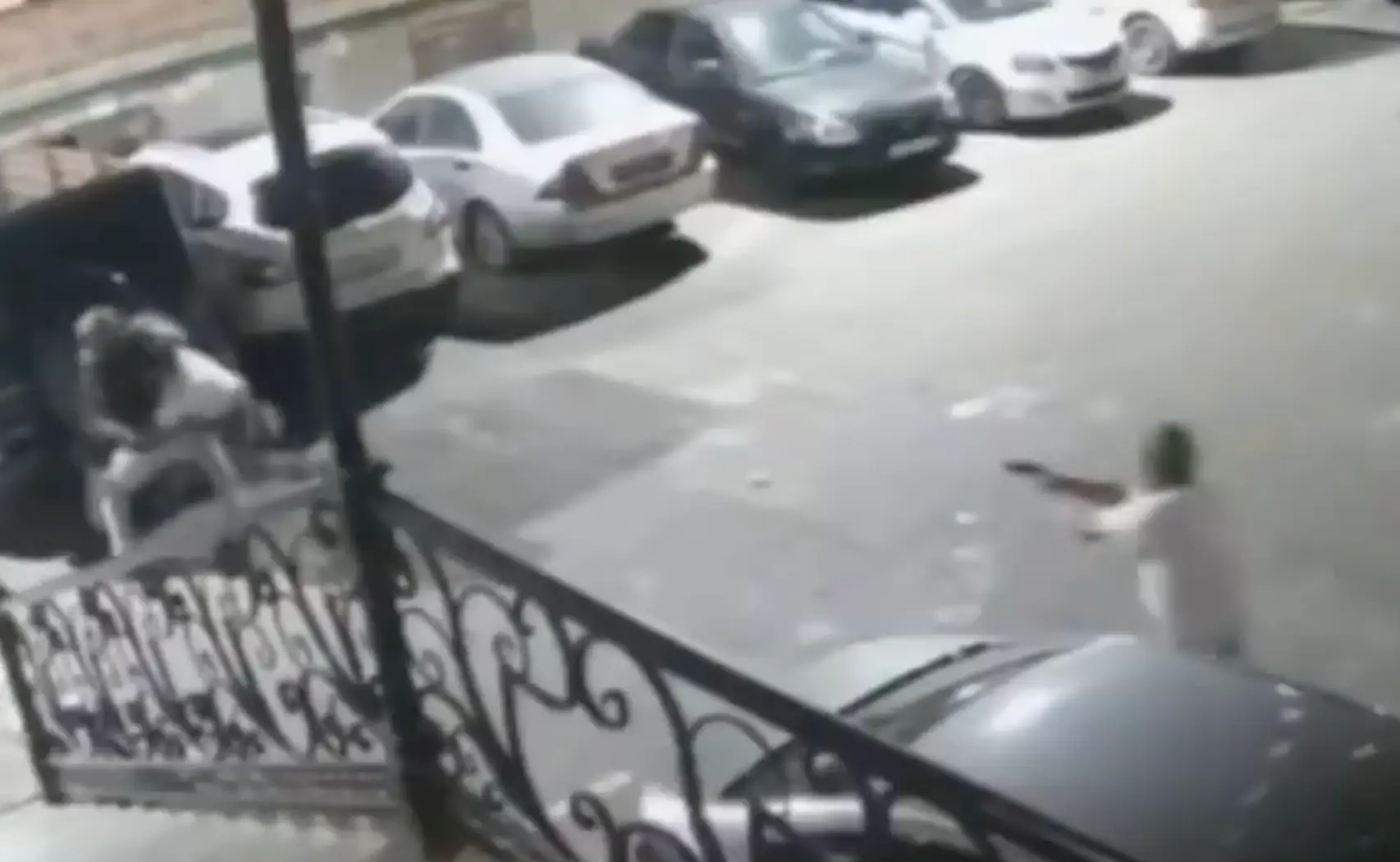 The masked gunman allegedly attacked Khizriev as he unloaded his car. (Image: Вестник ММА)