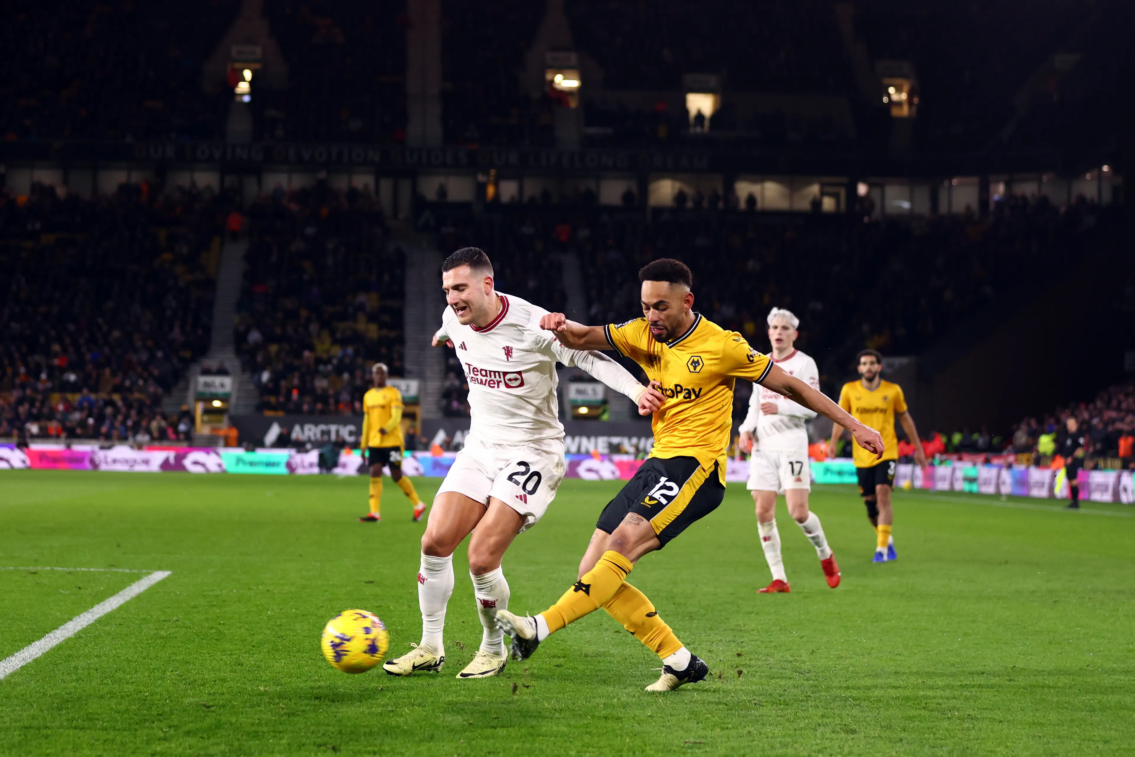 Diogo Dalot came up against Matheus Cunha last season. (Image: Marc Atkins / Contributor via Getty)