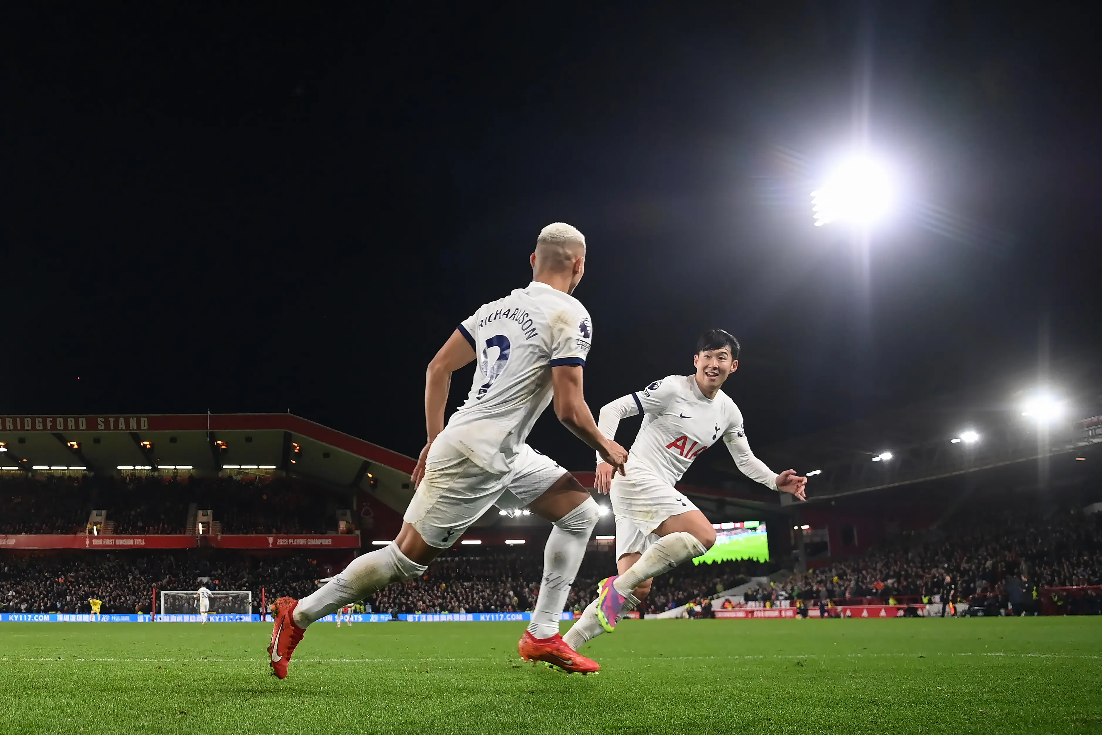 Richarlison celebrates with Son Heung-Min after scoring the first of the game. (