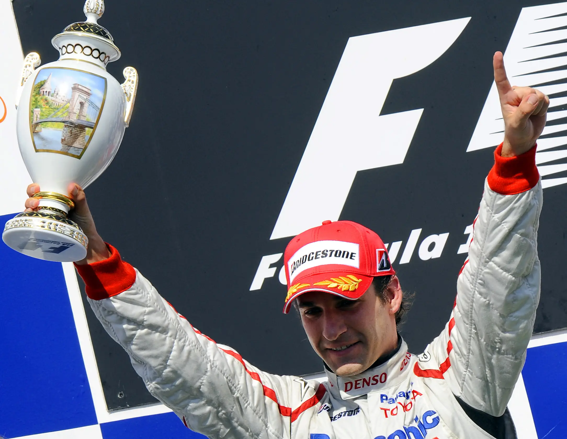 Toyota's German driver Timo Glock celebrates on the podium of the Hungaroring racetrack on August 3, 2008 in Budapest after the Formula One Hungarian Grand Prix.  (Getty Images)