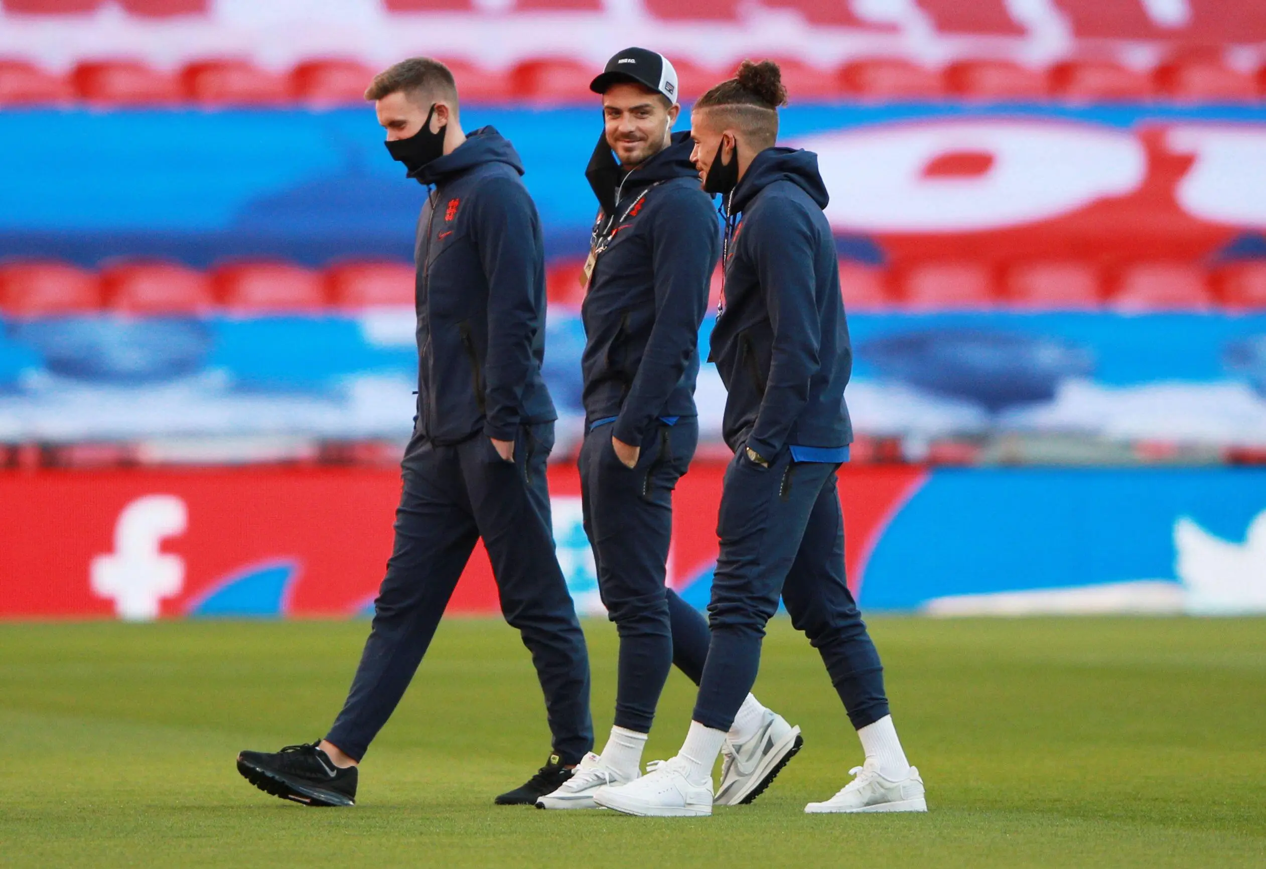 Jack Grealish jokes with Kalvin Phillips on England duty. REUTERS / Alamy