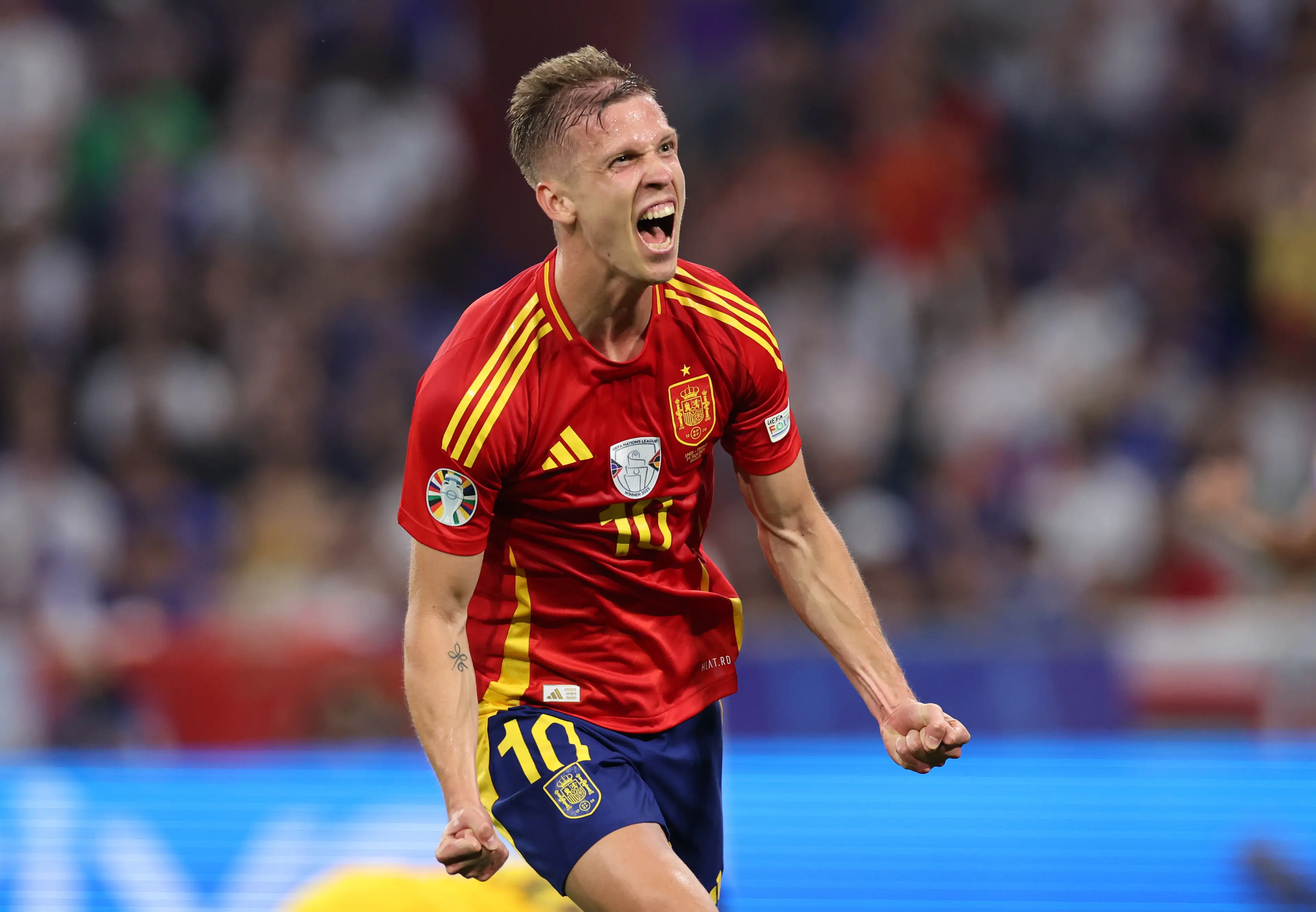 Dani Olmo celebrates scoring a goal for Spain. Image: Getty 