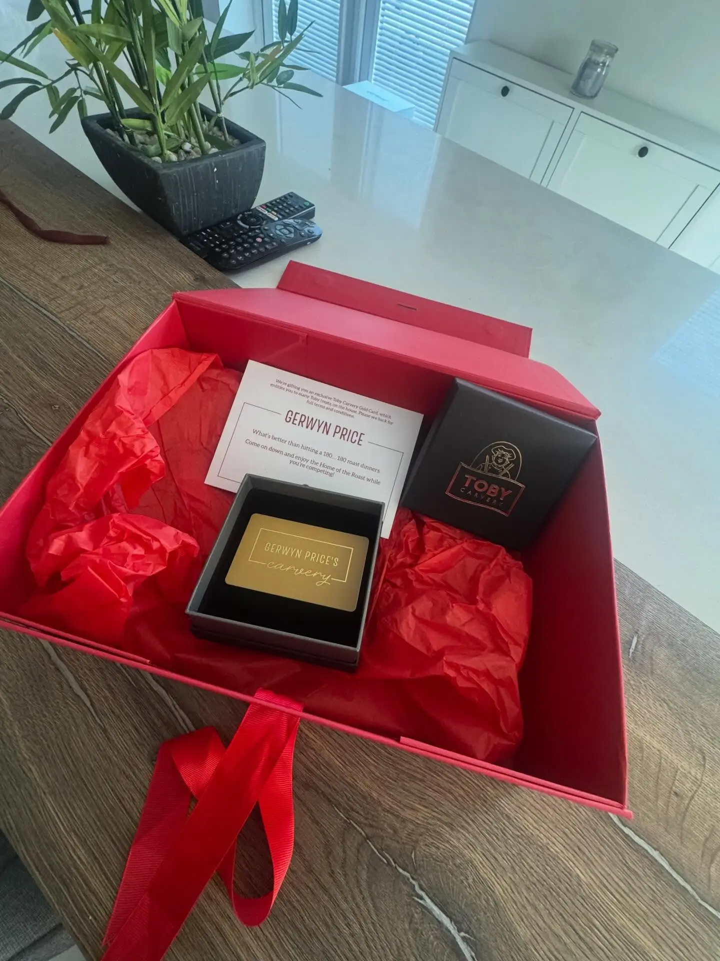 Gerwyn Price shows off his new Gold Card. Image credit: Facebook/Gerwyn Price