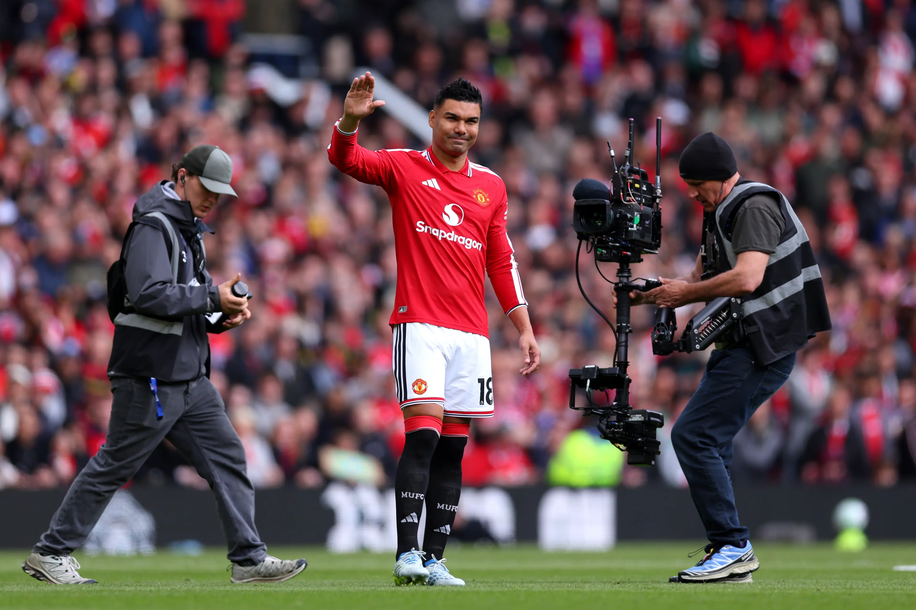 Casemiro waves to the Old Trafford crowd. Image credit: Getty