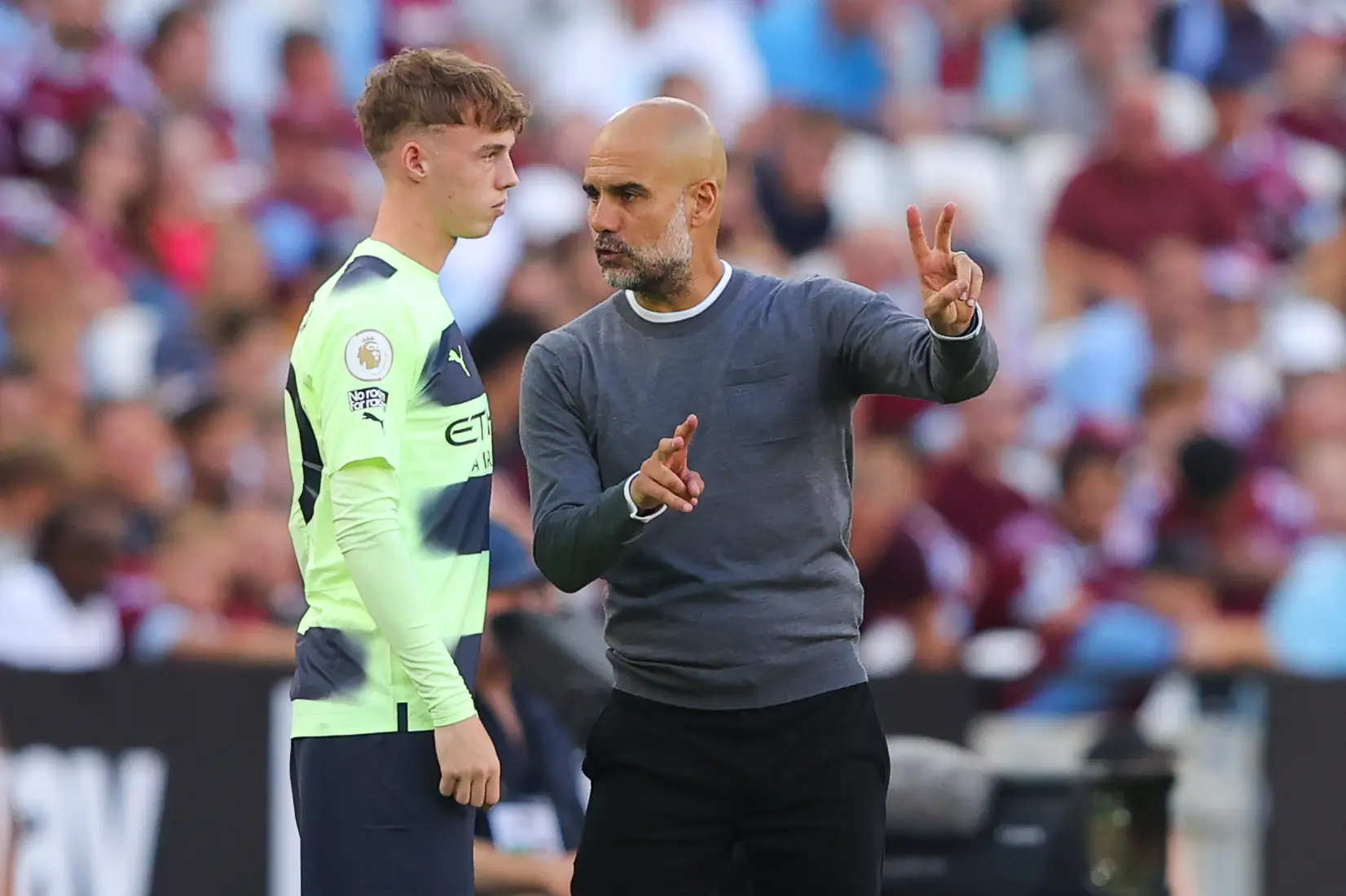 Pep Guardiola and Cole Palmer at Manchester City. (Image: James Gill - Danehouse / Contributor via Getty)