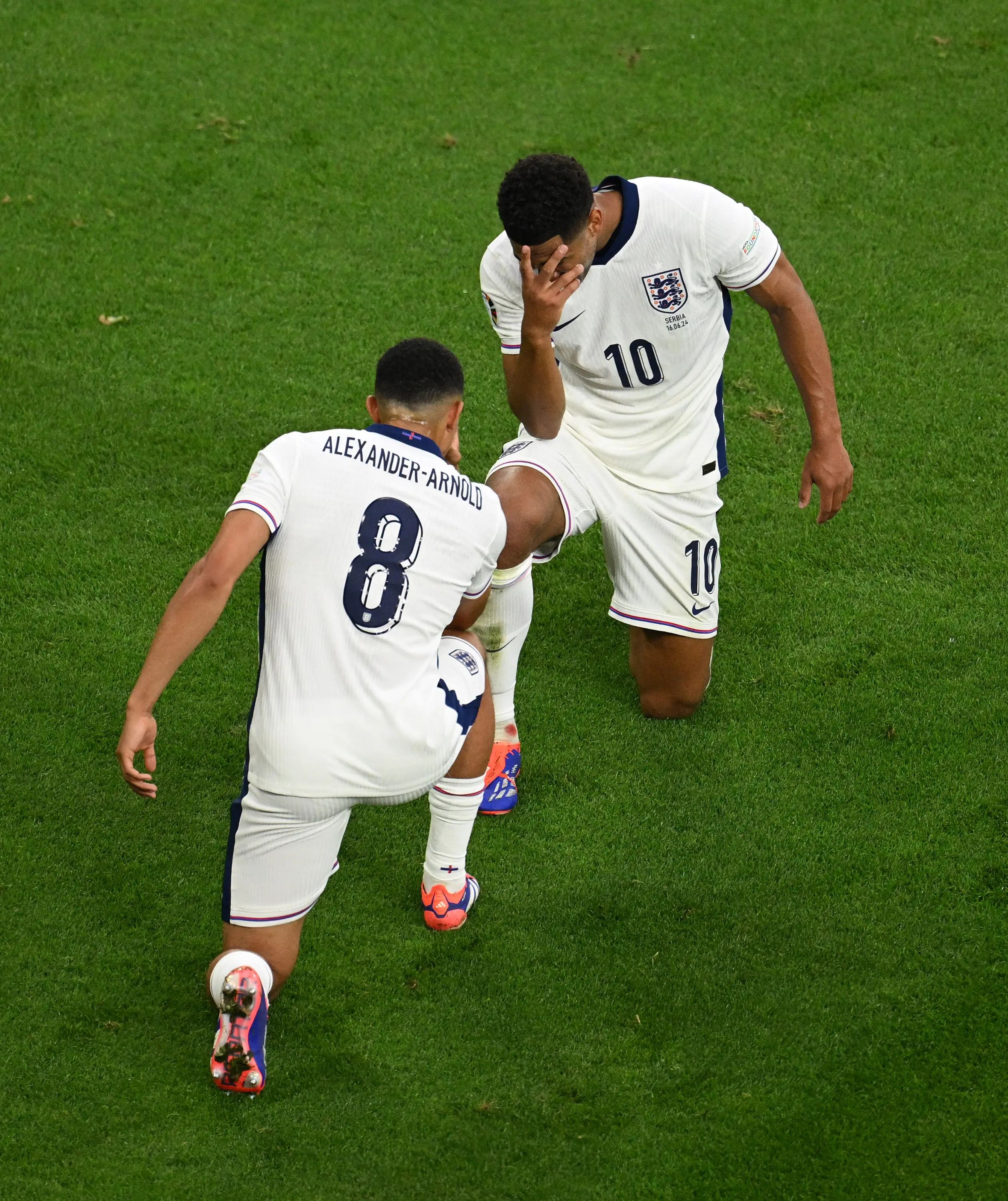 Jude Bellingham and Trent Alexander-Arnold celebrate England's goal against Serbia. Image: Getty 