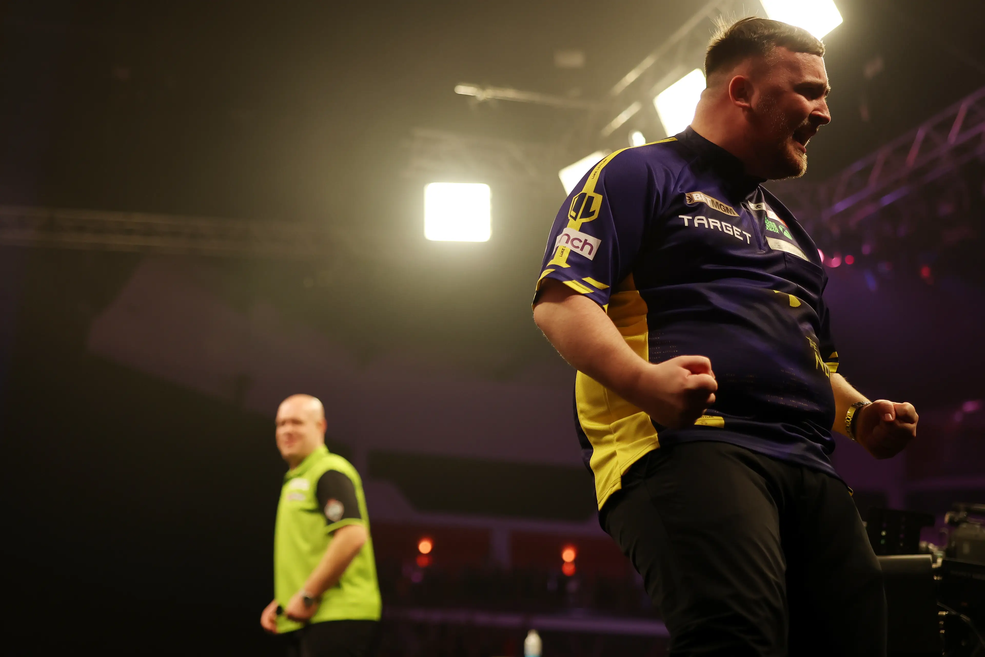 Luke Littler celebrates hitting a nine-darter against Michael van Gerwen. Image: Getty
