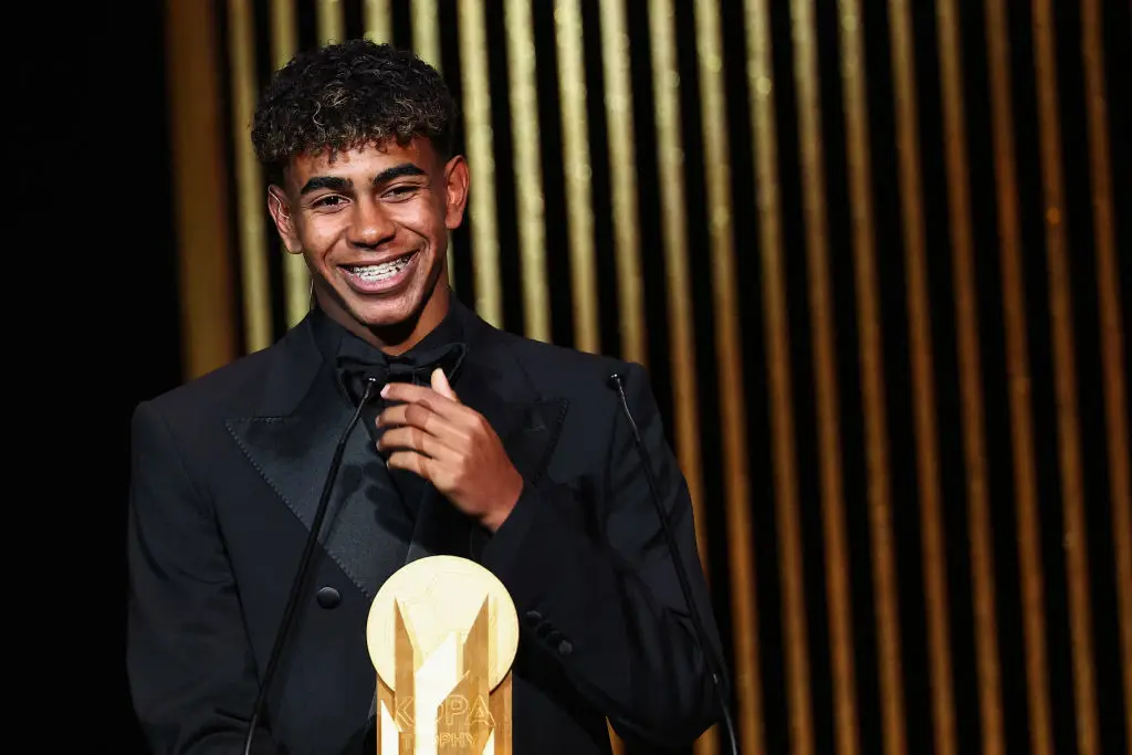 Lamine Yamal receivds the Kopa Trophy for best under-21 player during the 2024 Ballon d'Or ceremony. (Image: Getty)