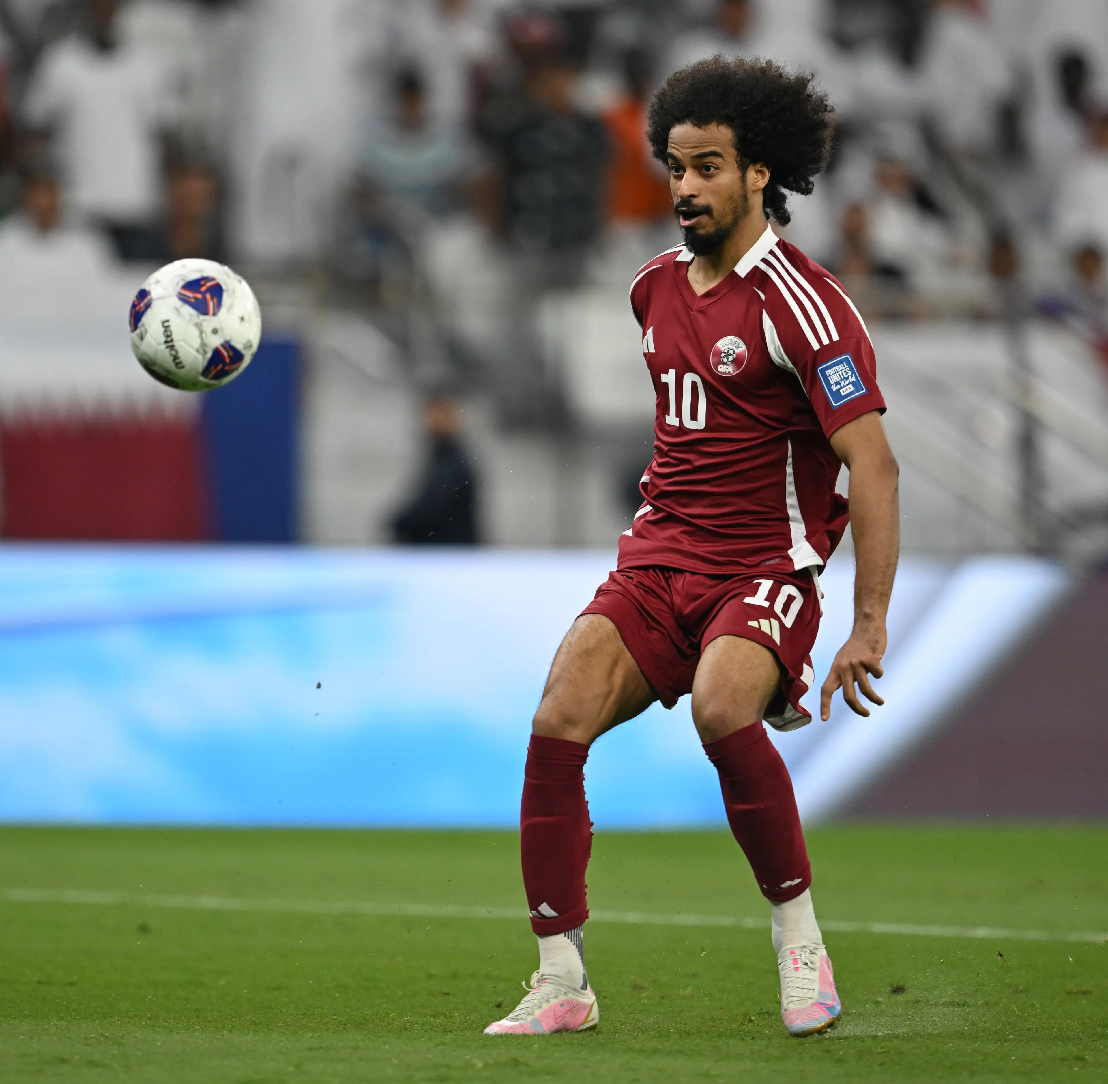 Akram Afif playing for Qatar. Image: Simon Holmes / Contributor via Getty