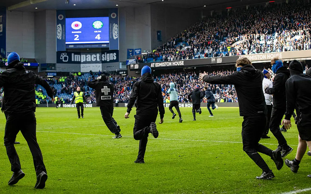 Fans from both teams stormed the Ibrox pitch after the final whistle. (Image: Alan Harvey/SNS Group via Getty Images)