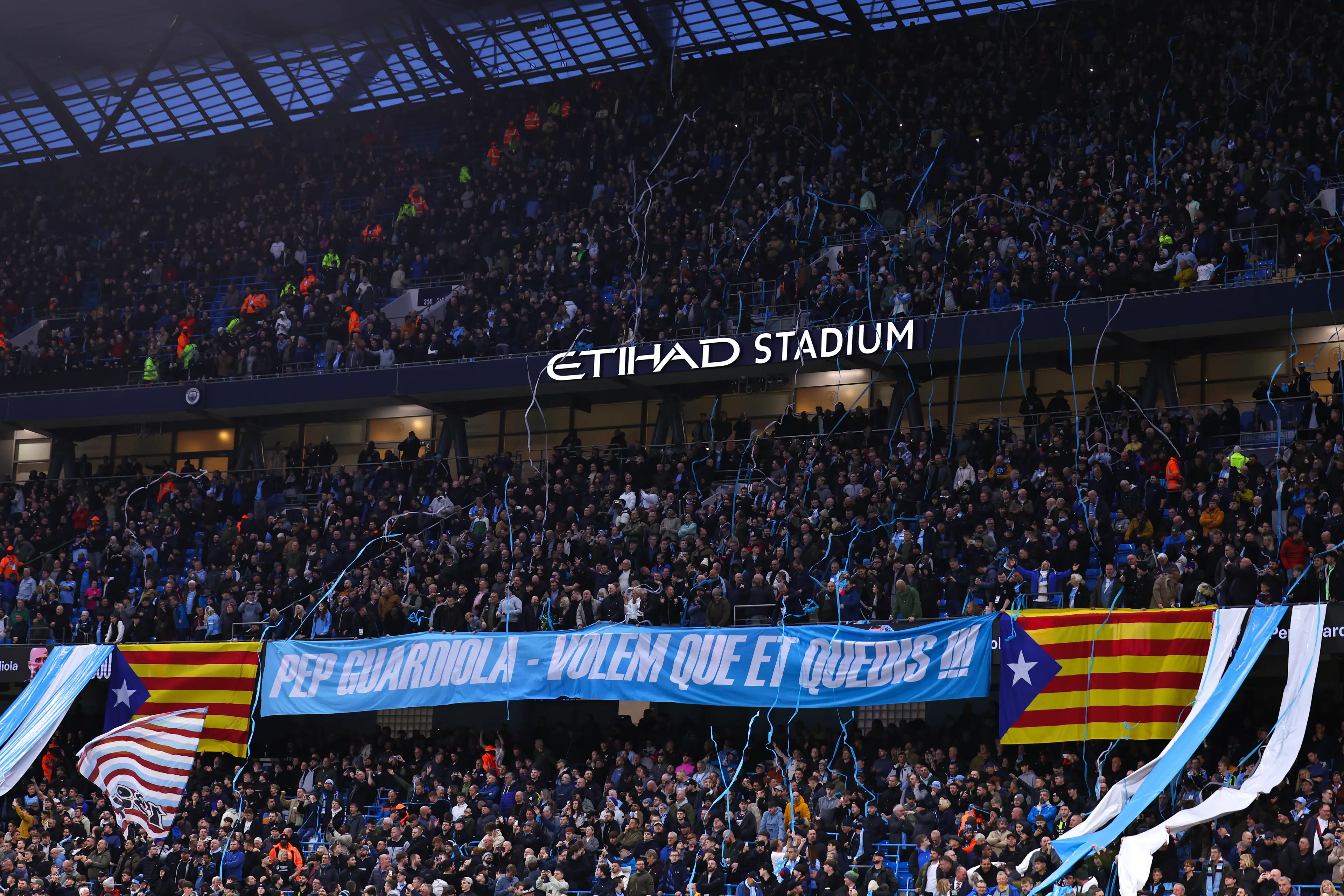 City fans paid tribute to Guardiola against Liverpool. Image: Getty