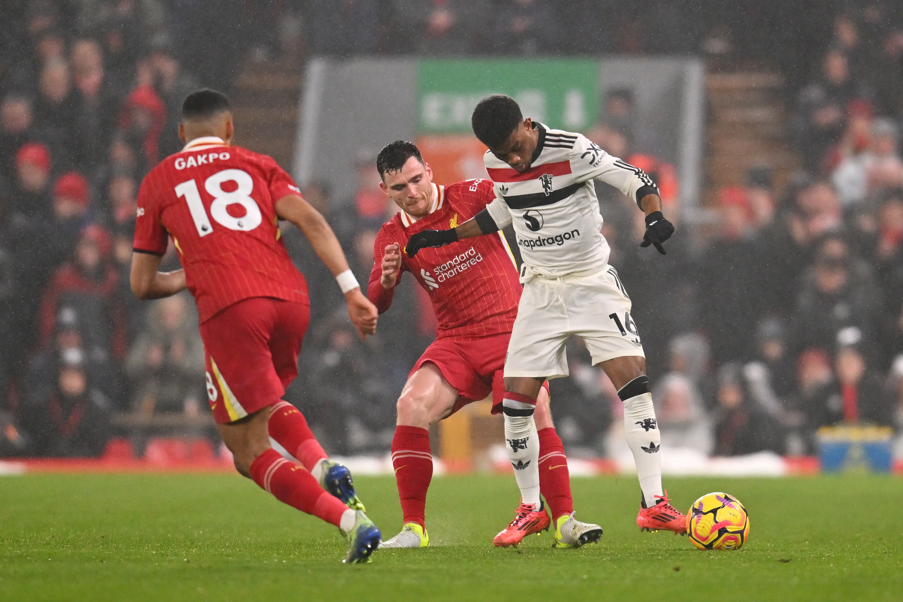 Amad Diallo and Andy Robertson during the 2-2 draw at Anfield in the Premier League- Getty