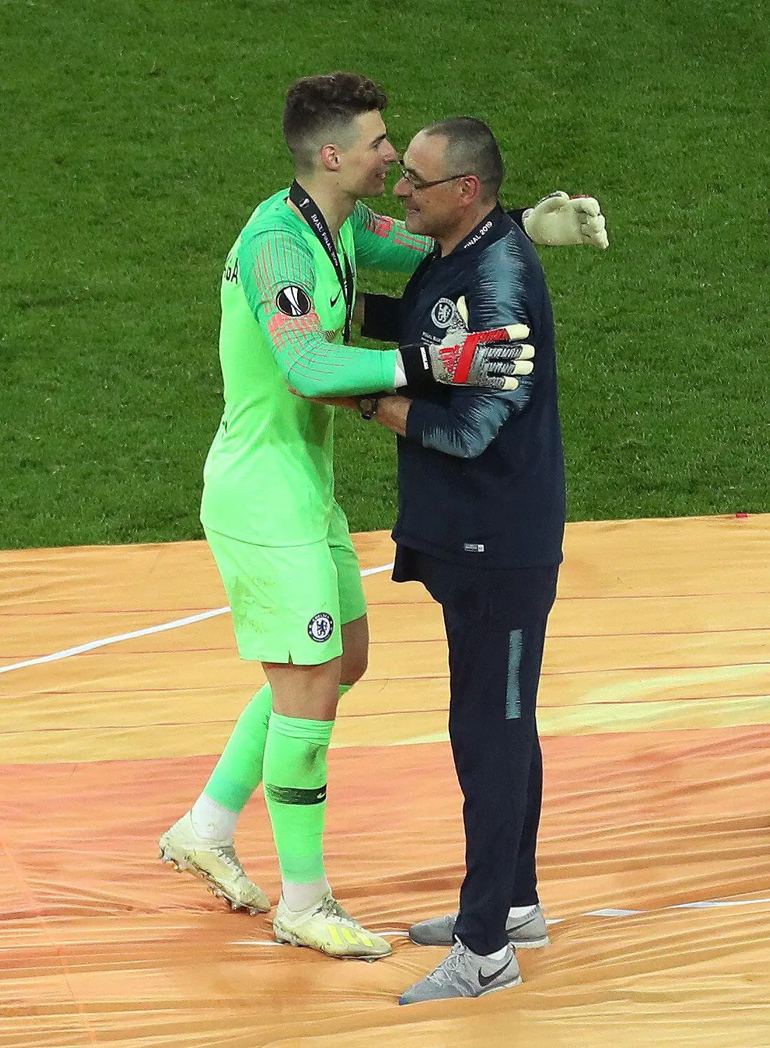Chelsea manager Maurizio Sarri (right) and goalkeeper Kepa Arrizabalaga celebrate winning the Europa League . (Alamy)