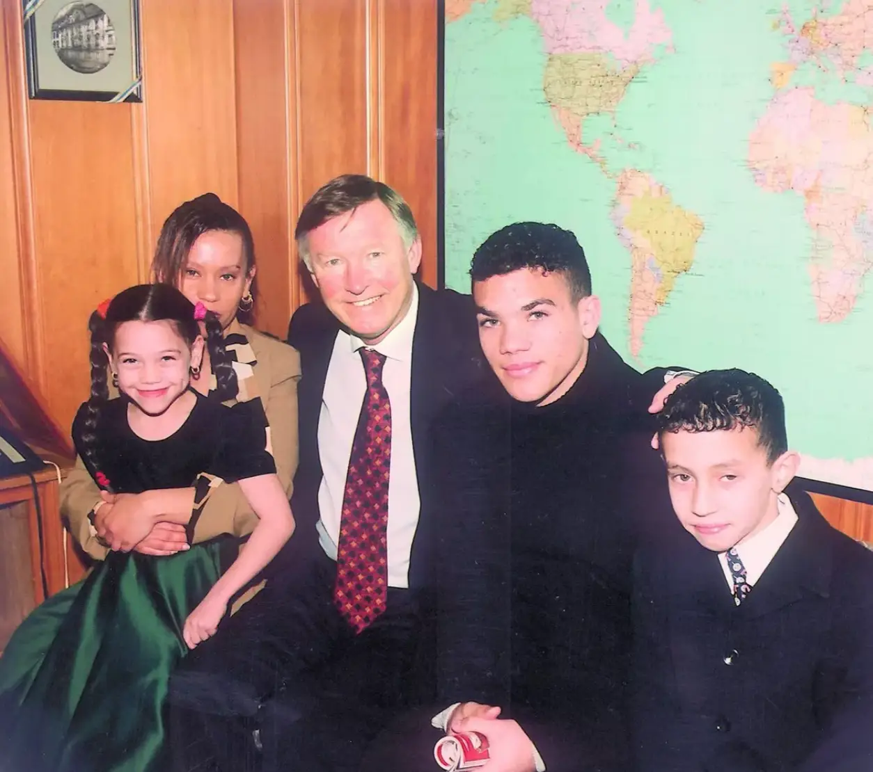 Calliste and his family meet Sir Ferguson in 2000. Image credit: Wales Online