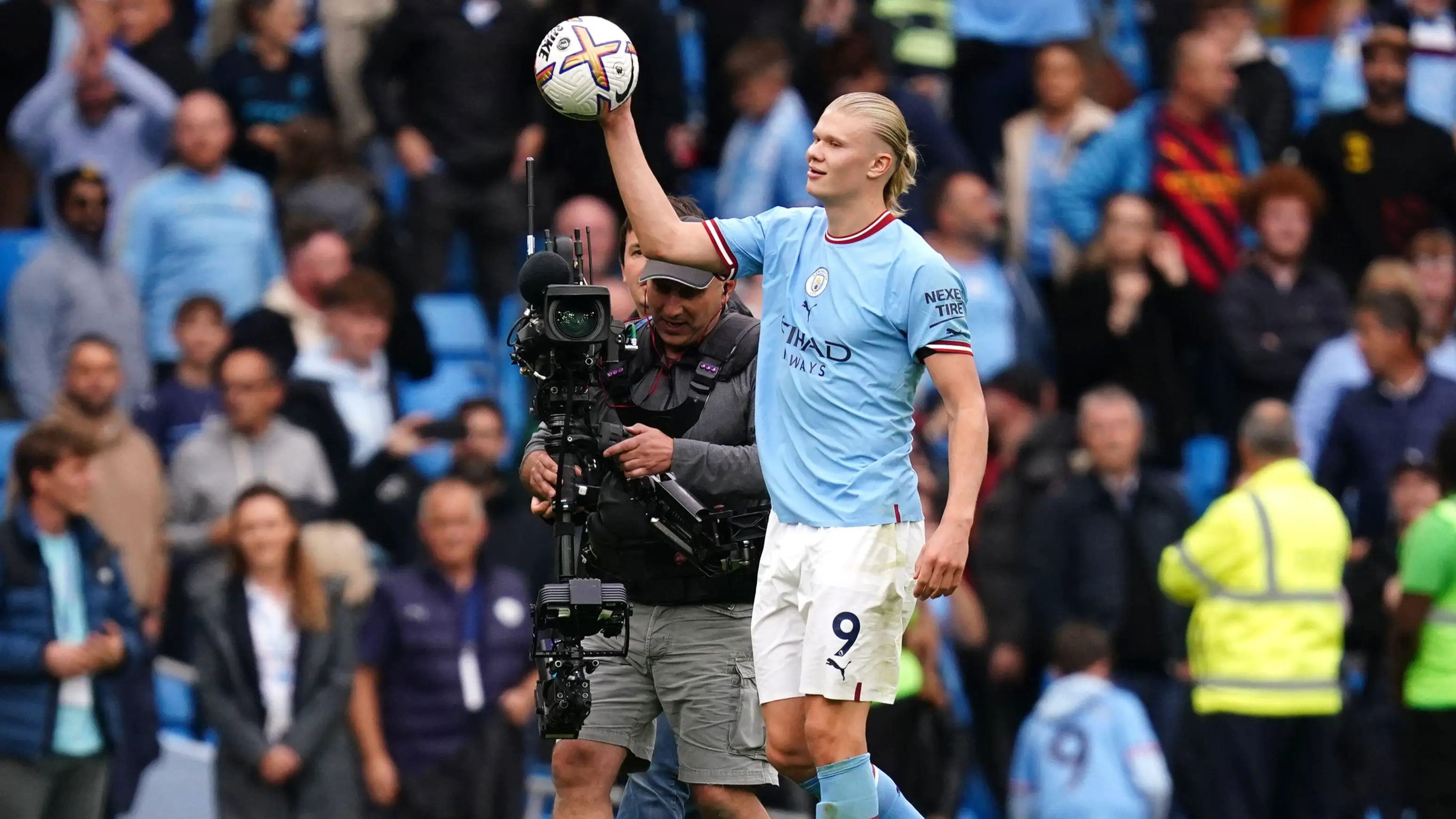 Haaland walks away with the match ball. Image: Alamy