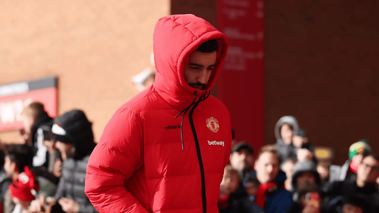 Fernandes had his hood down while walking into Old Trafford (Image: Getty)
