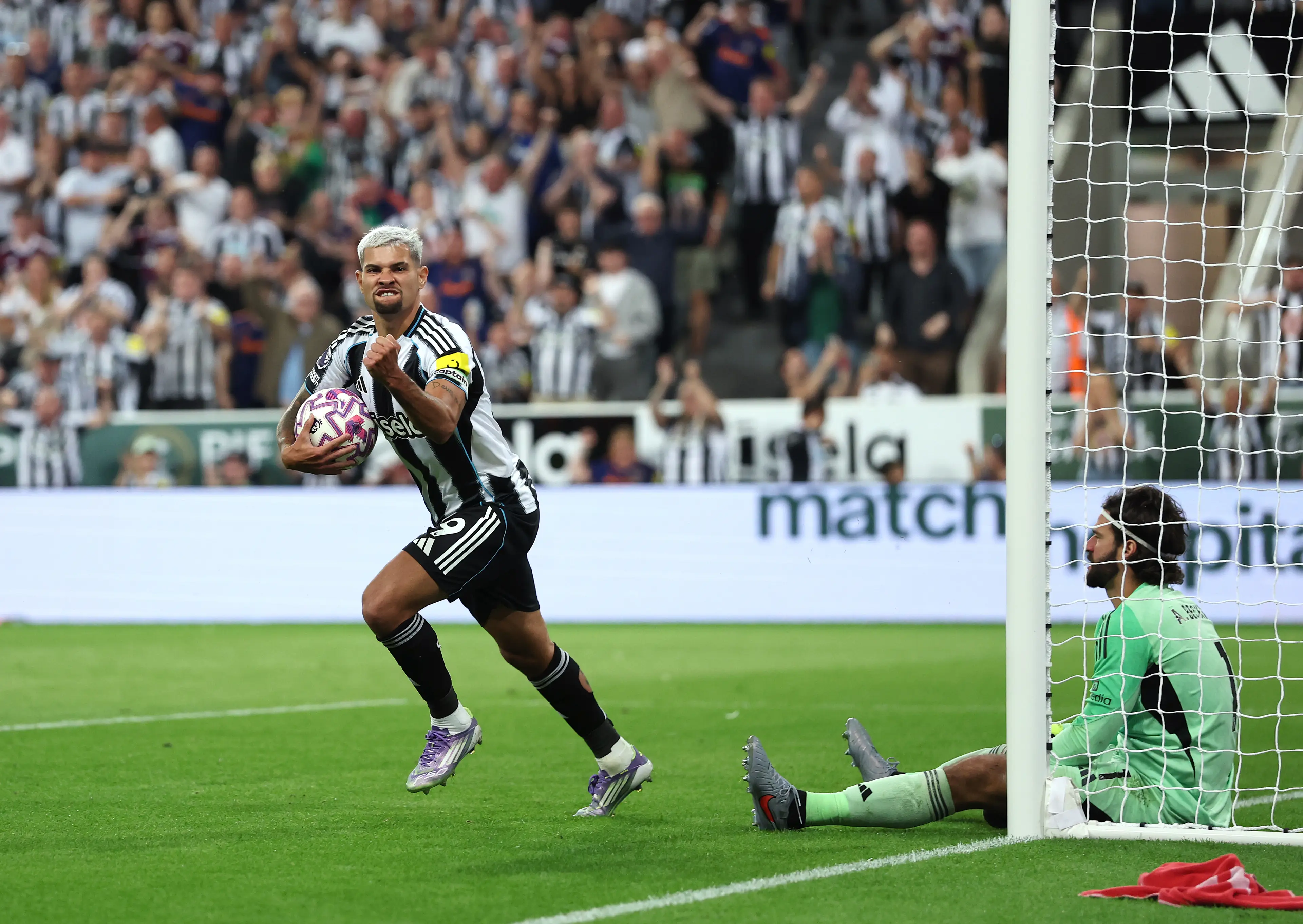 Bruno Guimaraes wheels away in celebration after scoring for Newcastle United against Liverpool. Image: Getty 
