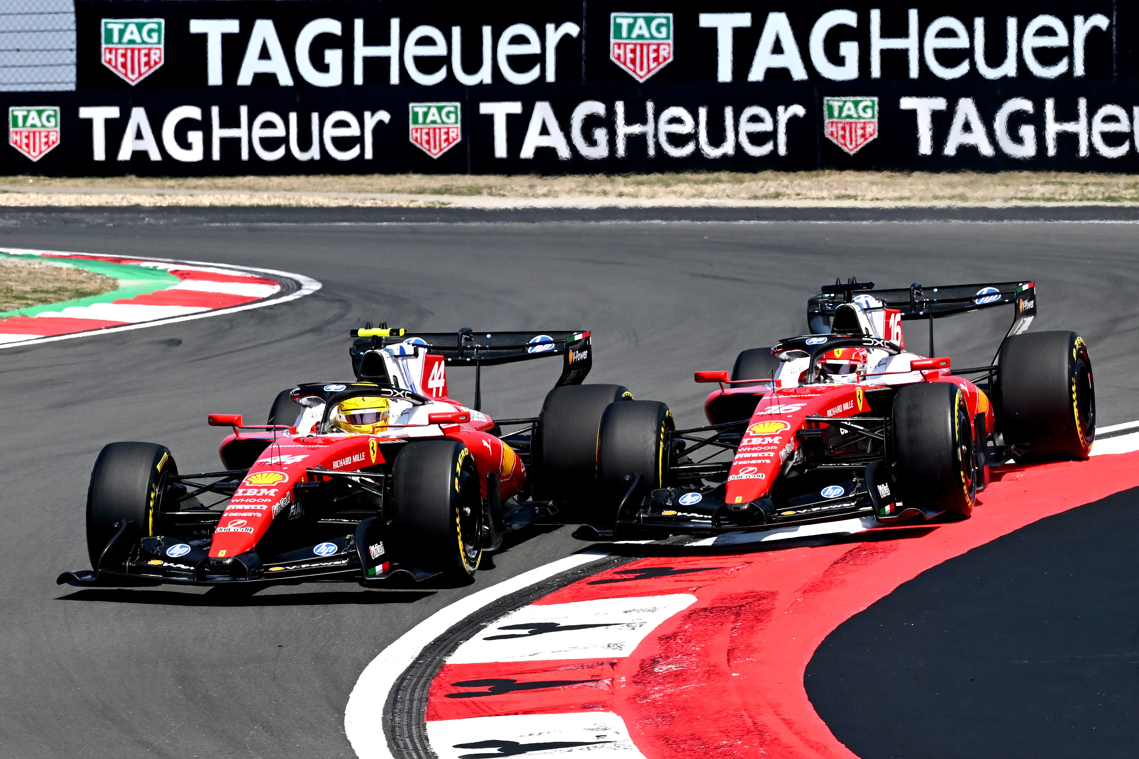 Lewis Hamilton and Charles Leclerc battling at the Chinese Grand Prix (credit: getty)