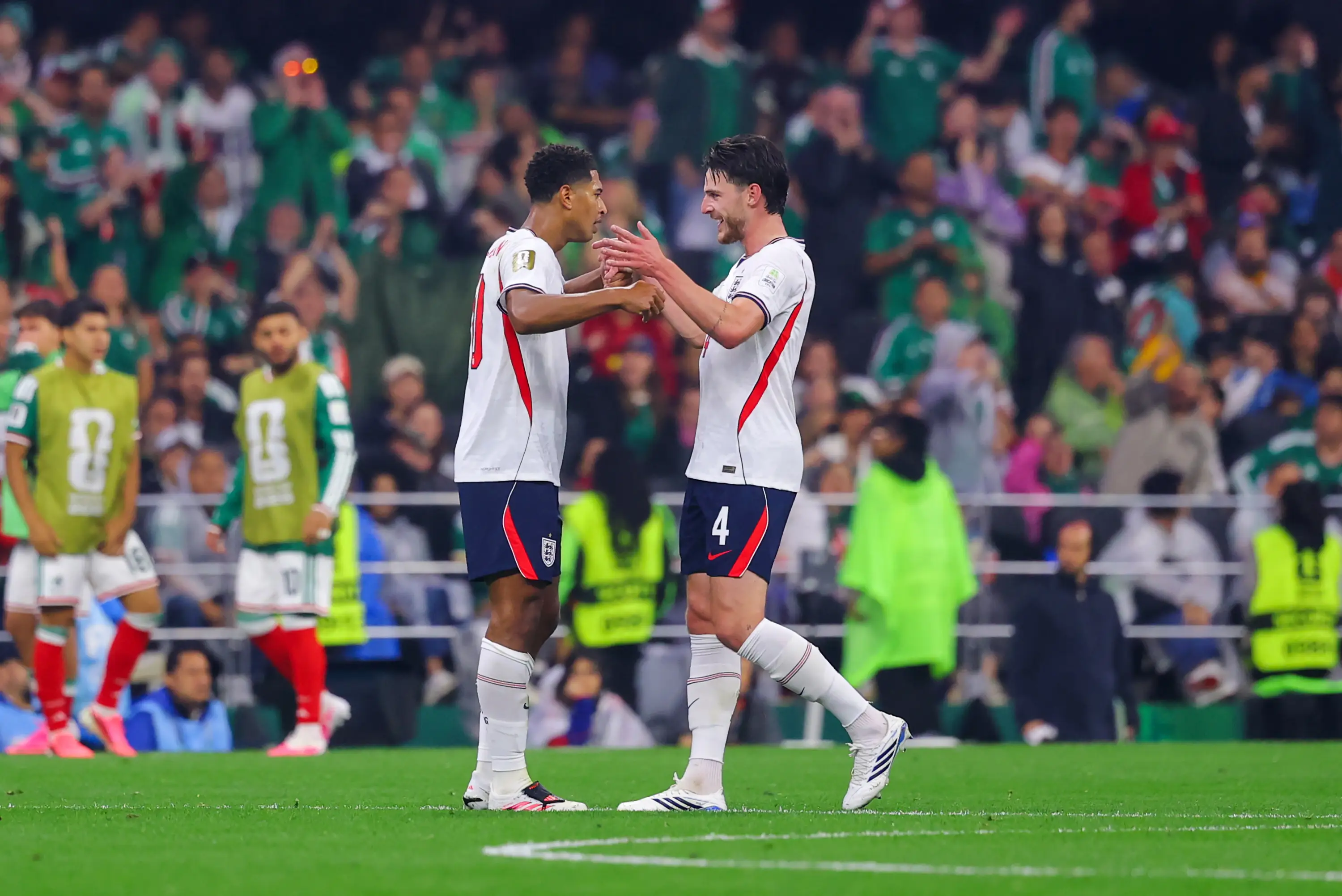 Jude Bellingham of England celebrates with teammate Declan Rice after scoring their team's first goal during the FIFA World Cup 2026 Round Of 16 (Getty Images)