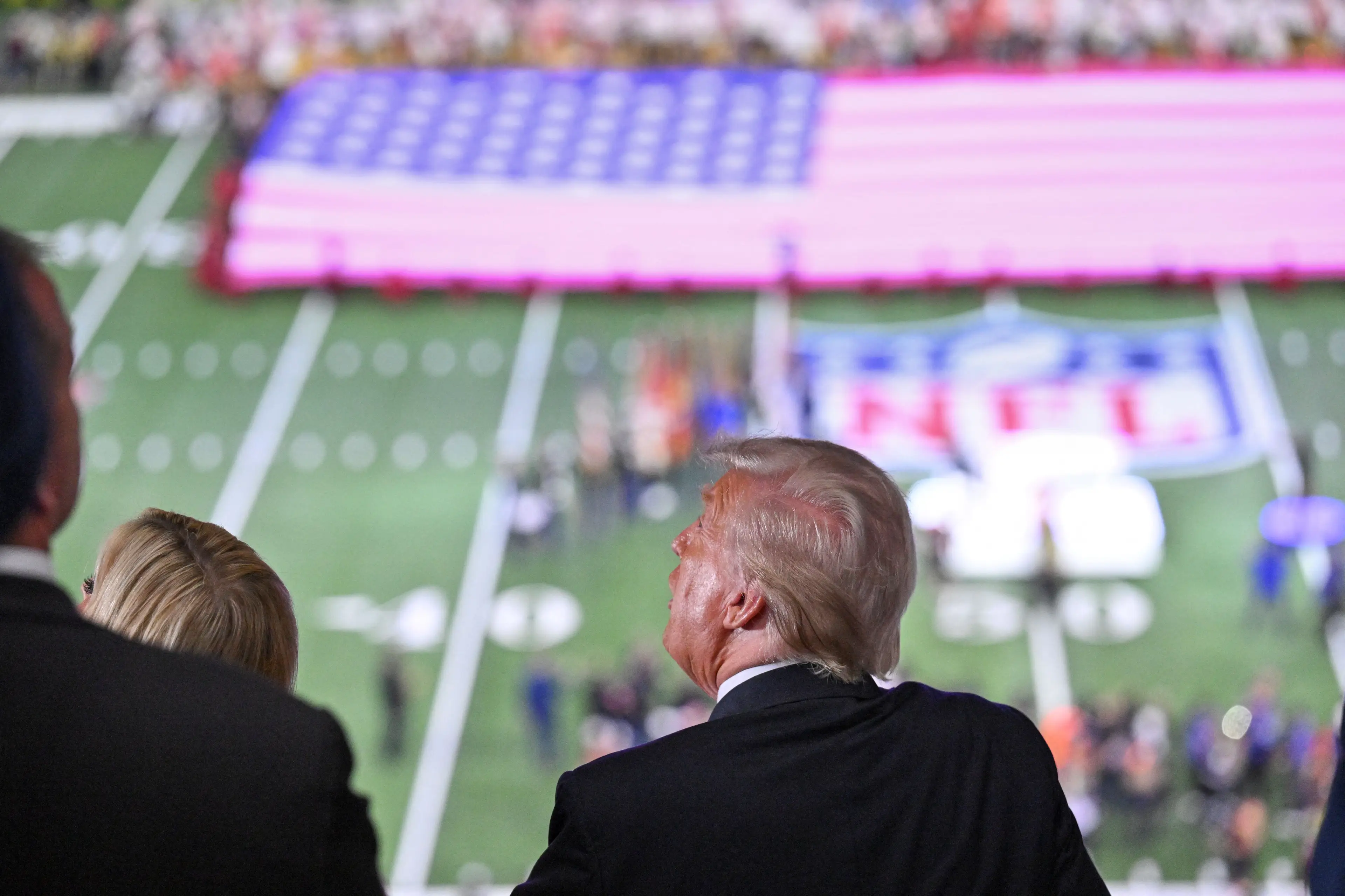 Donald Trump watches the pre-game show before Super Bowl LIX between the Kansas City Chiefs and the Philadelphia Eagles. Image credit: Getty