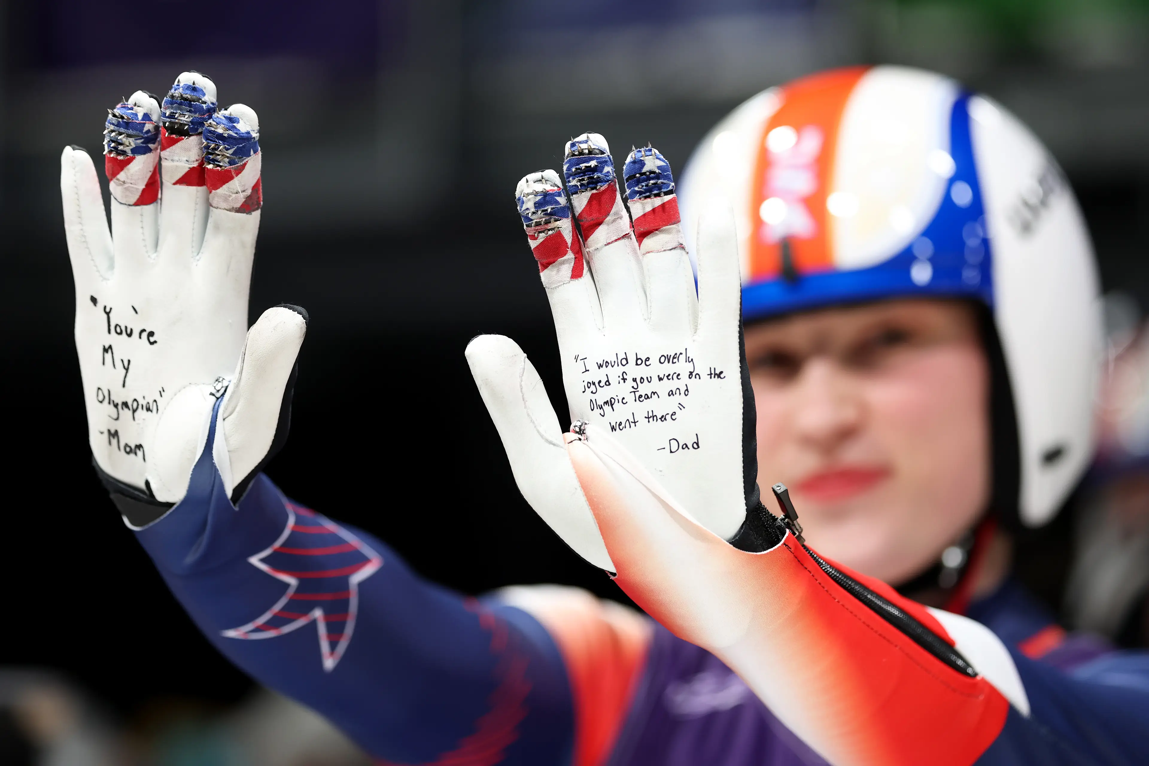 Kirkby wrote well-wishes from her mother and late father on her gloves at the Winter Olympics (Image: Getty)