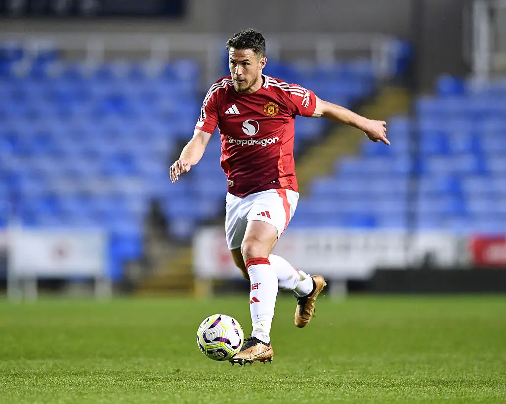 Tommy Rowe is player-coach at Manchester United (Credit:Getty)