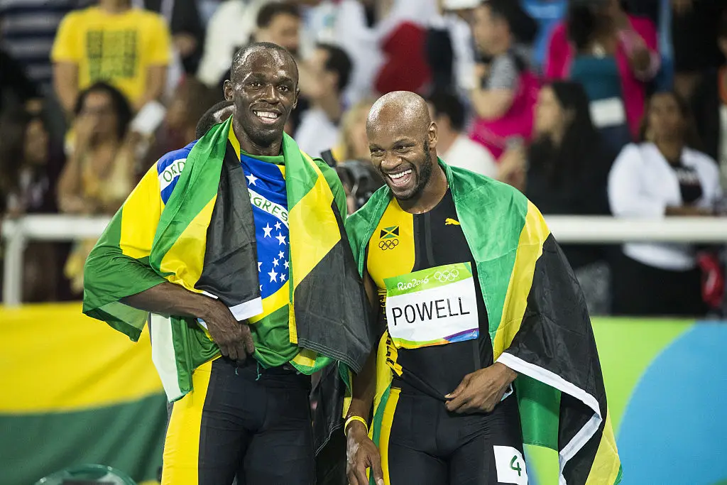 Usain Bolt and Asafa Powell (Credit:Getty)