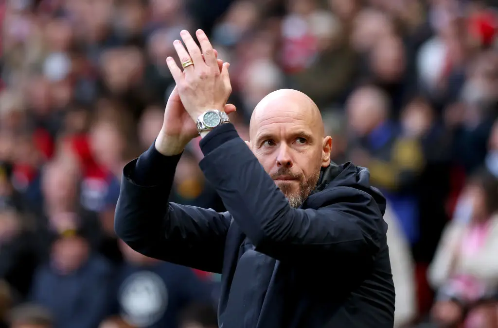 Erik ten Hag applauds Manchester United fans at Old Trafford -
