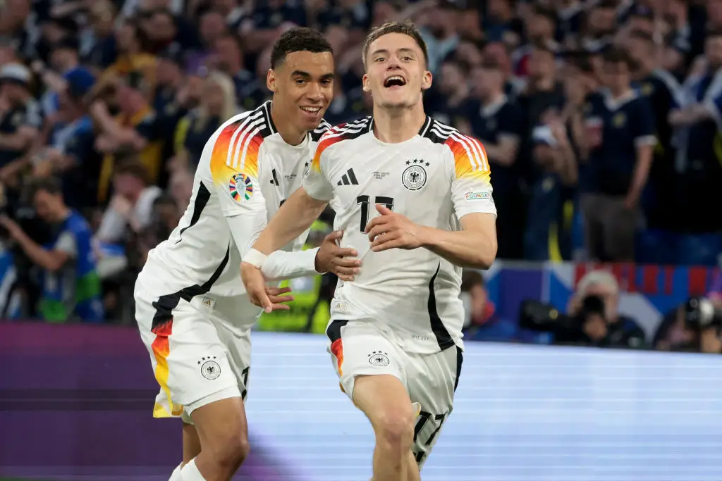 Germany players Florian Wirtz and Jamal Musiala celebrate during their side's 5-1 win over Scotland at Euro 2024 (