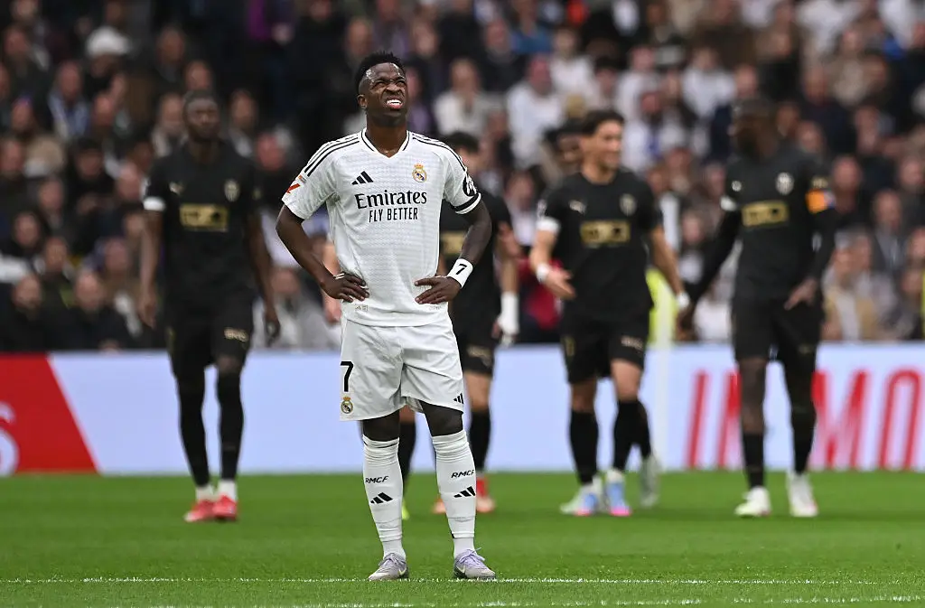 Vinicius Jr is at risk of missing the second leg of the Champions Leg clash with Arsenal. (Image: Getty)