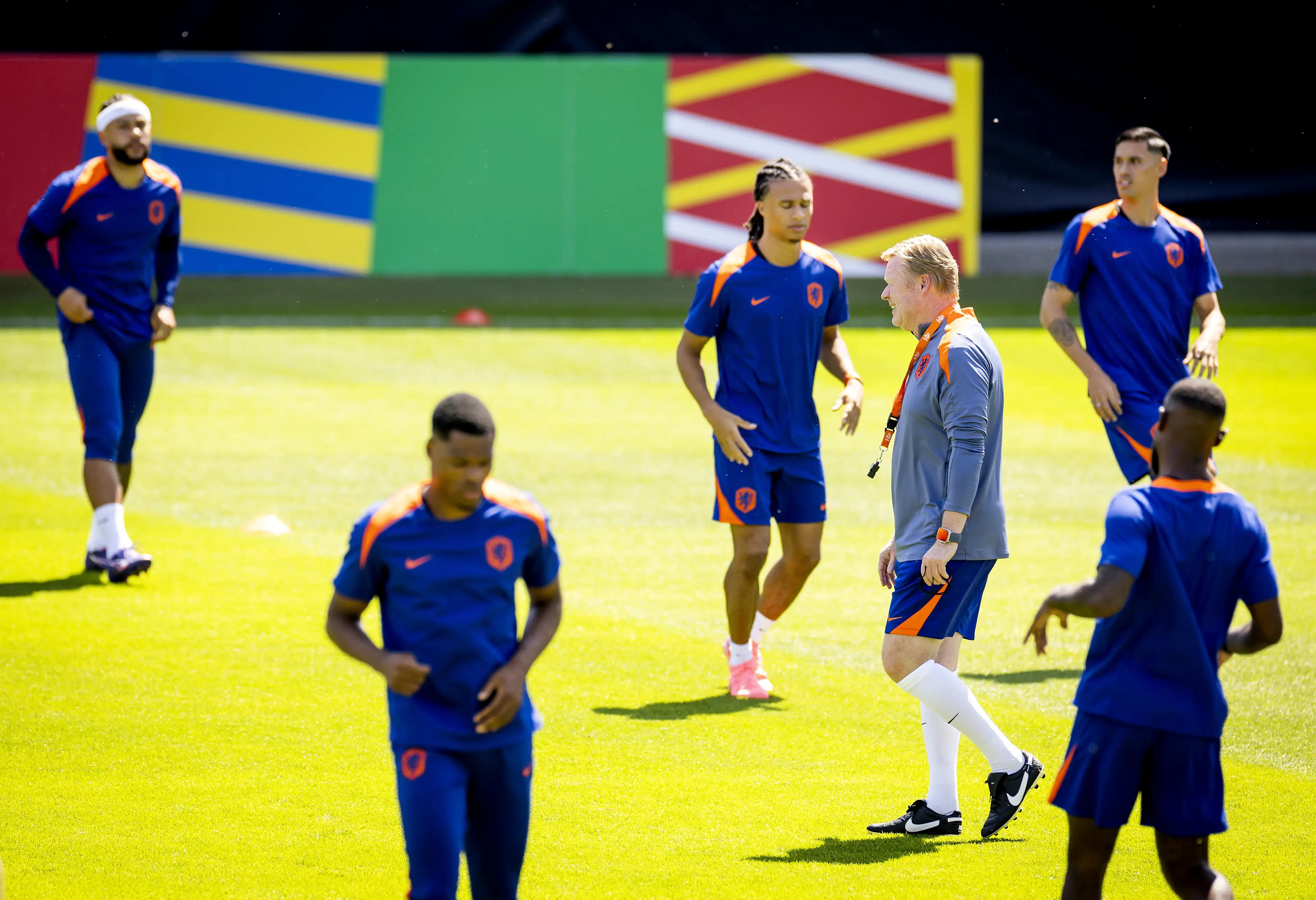 Memphis Depay, Denzel Dumfries, Nathan Ake, national coach Ronald Koeman and Tijjani Reijnders during a training session. Image credit: Getty