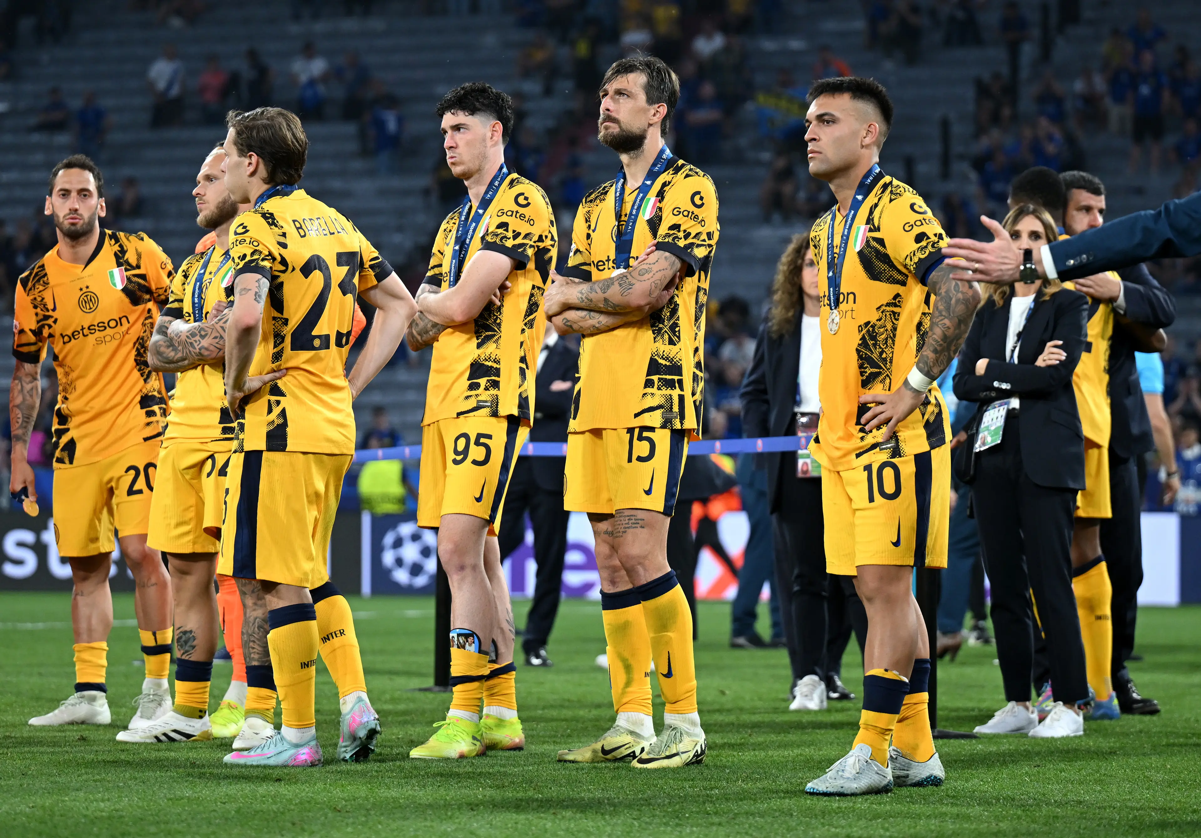 Inter Milan players watch on as Paris Saint-Germain celebrate their Champions League success. Image: Getty